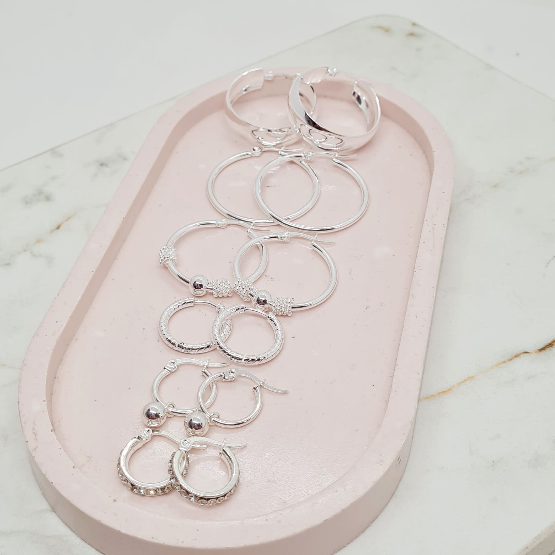 Imagen de producto COMBO DE ARGOLLAS DE ACERO BLANCO