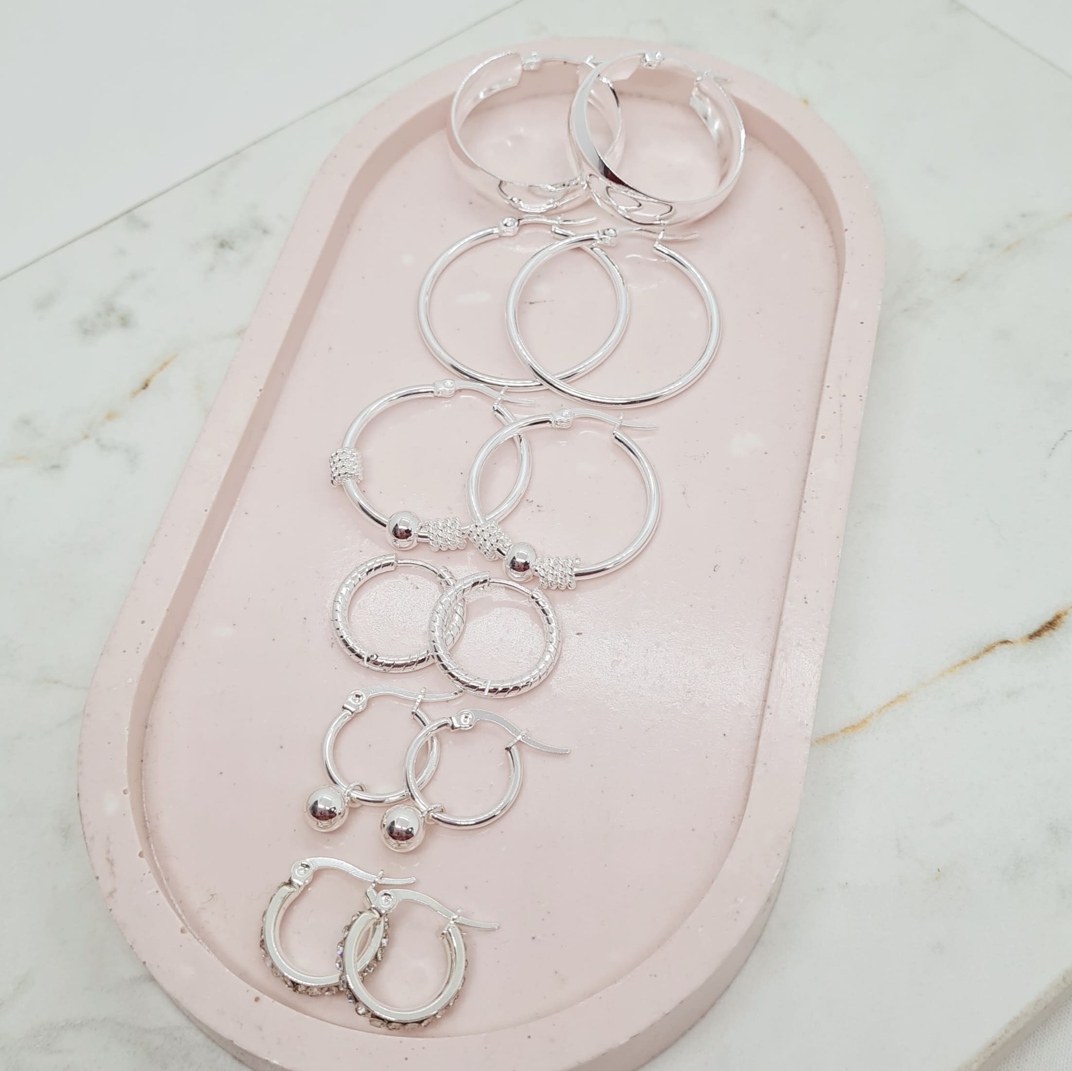 Imagen de producto COMBO DE ARGOLLAS DE ACERO BLANCO