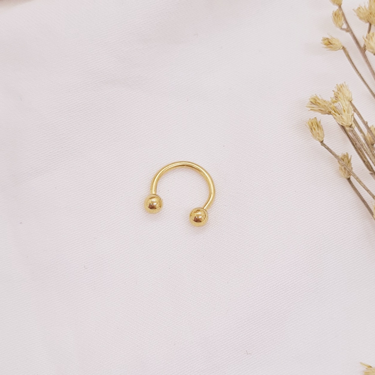 Imagen de producto PIERCING SEPTUM DORADO