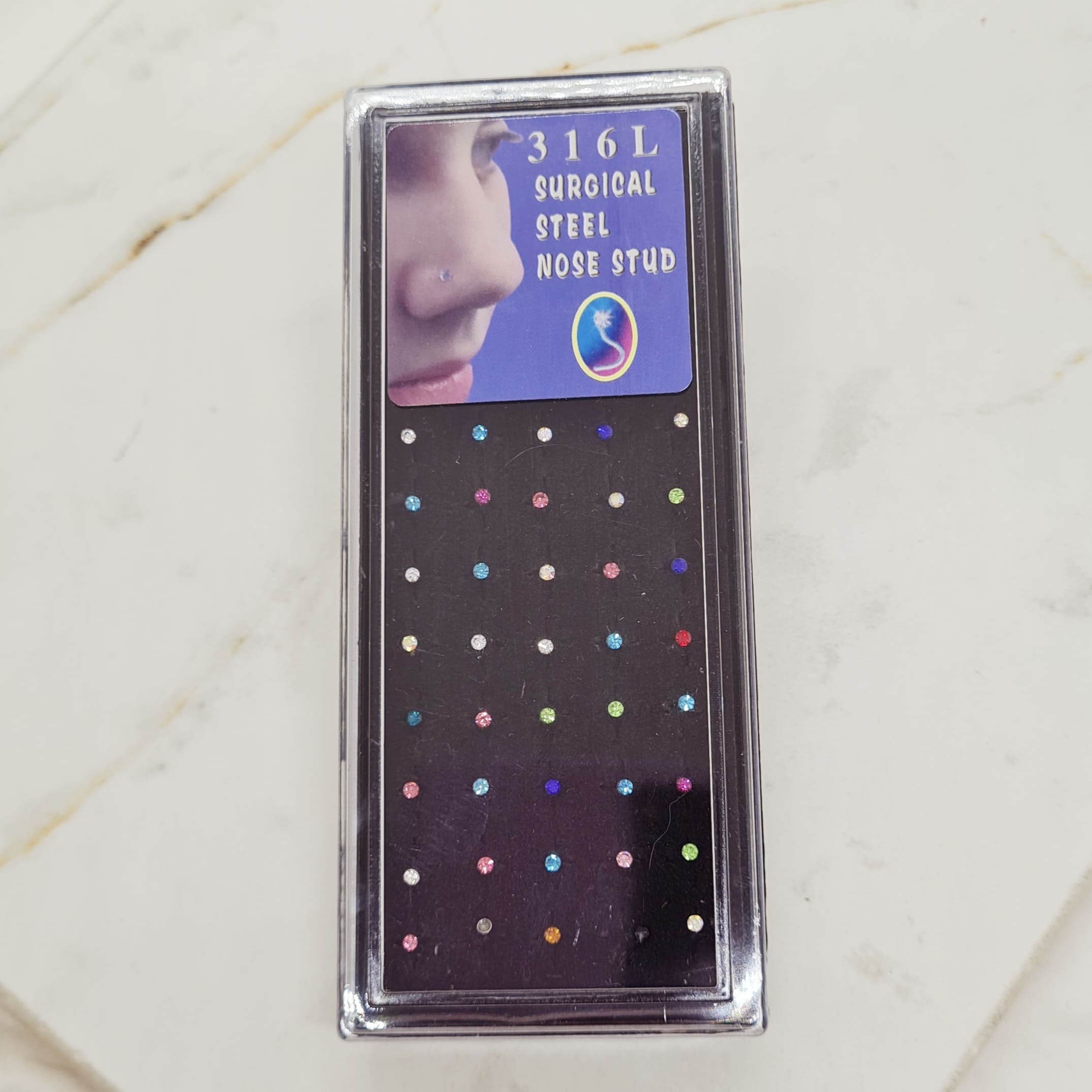 Imagen de producto PIERCING DE NARIZ NOSTRIL- STRASS COLORES CURVO  x40 UNIDADES