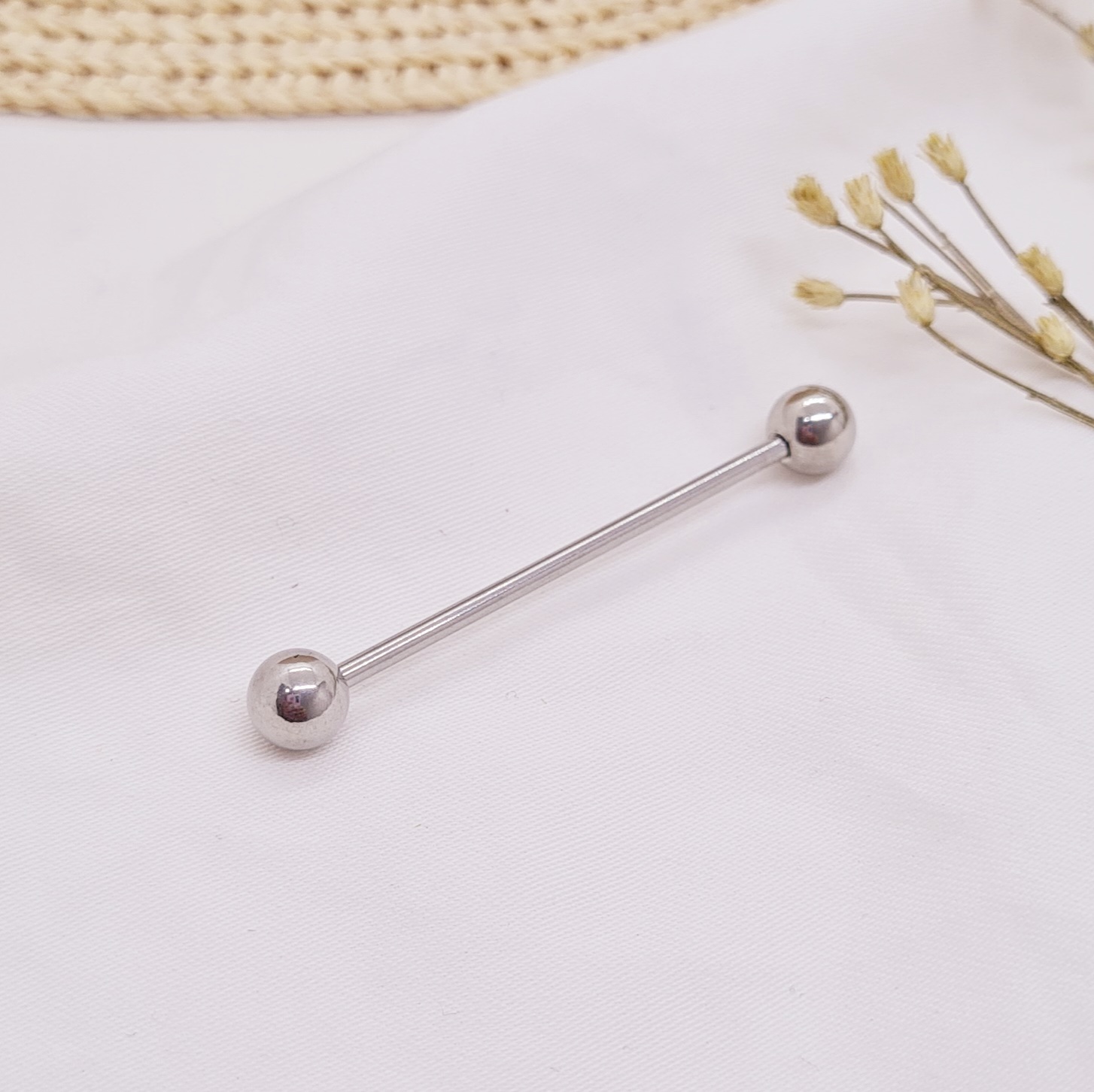 Imagen de producto PIERCING BARRA PARA OREJA PLATEADA
