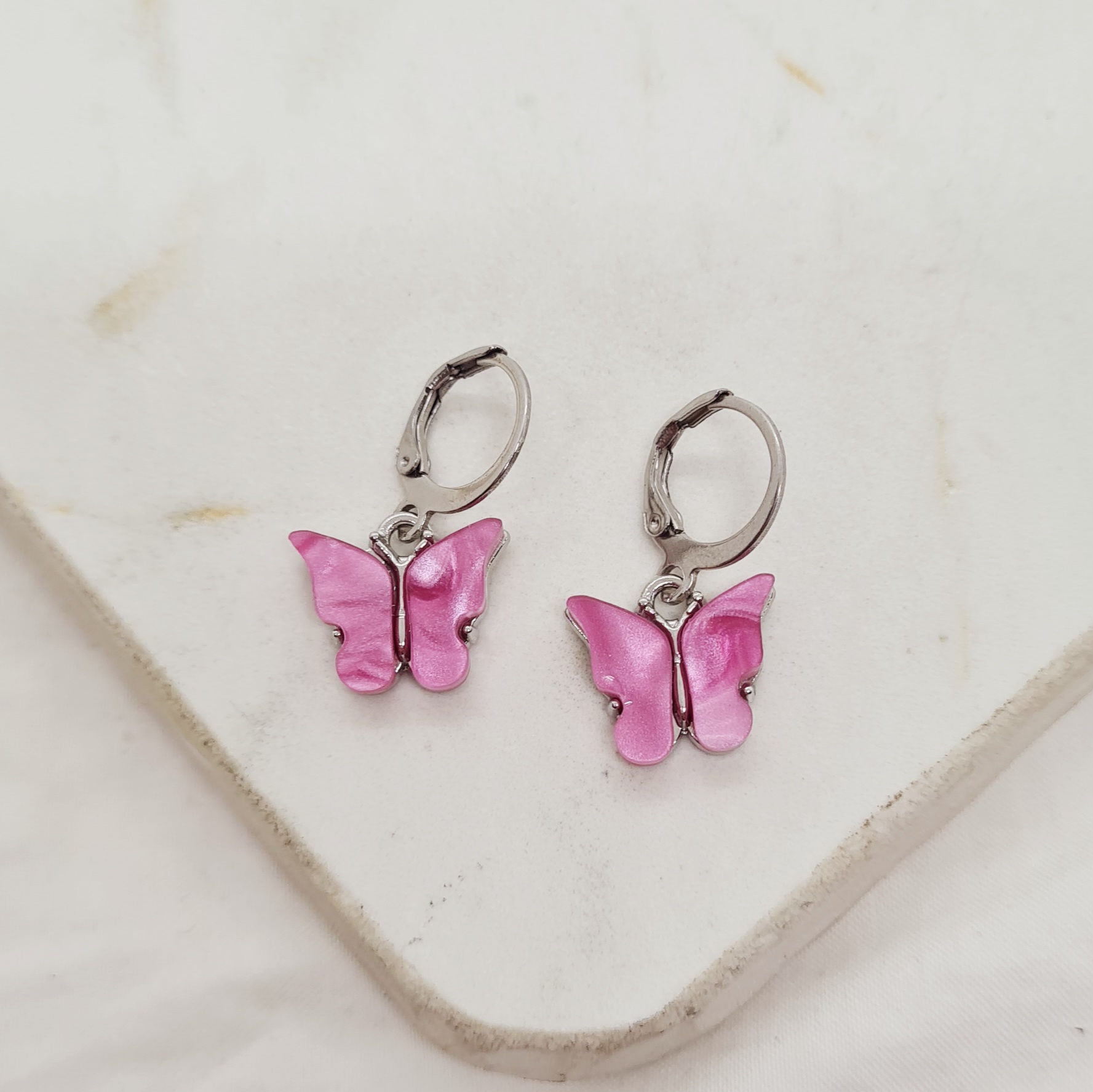 Imagen de producto ARGOLLA BRISURA MARIPOSA 2 - FUCSIA