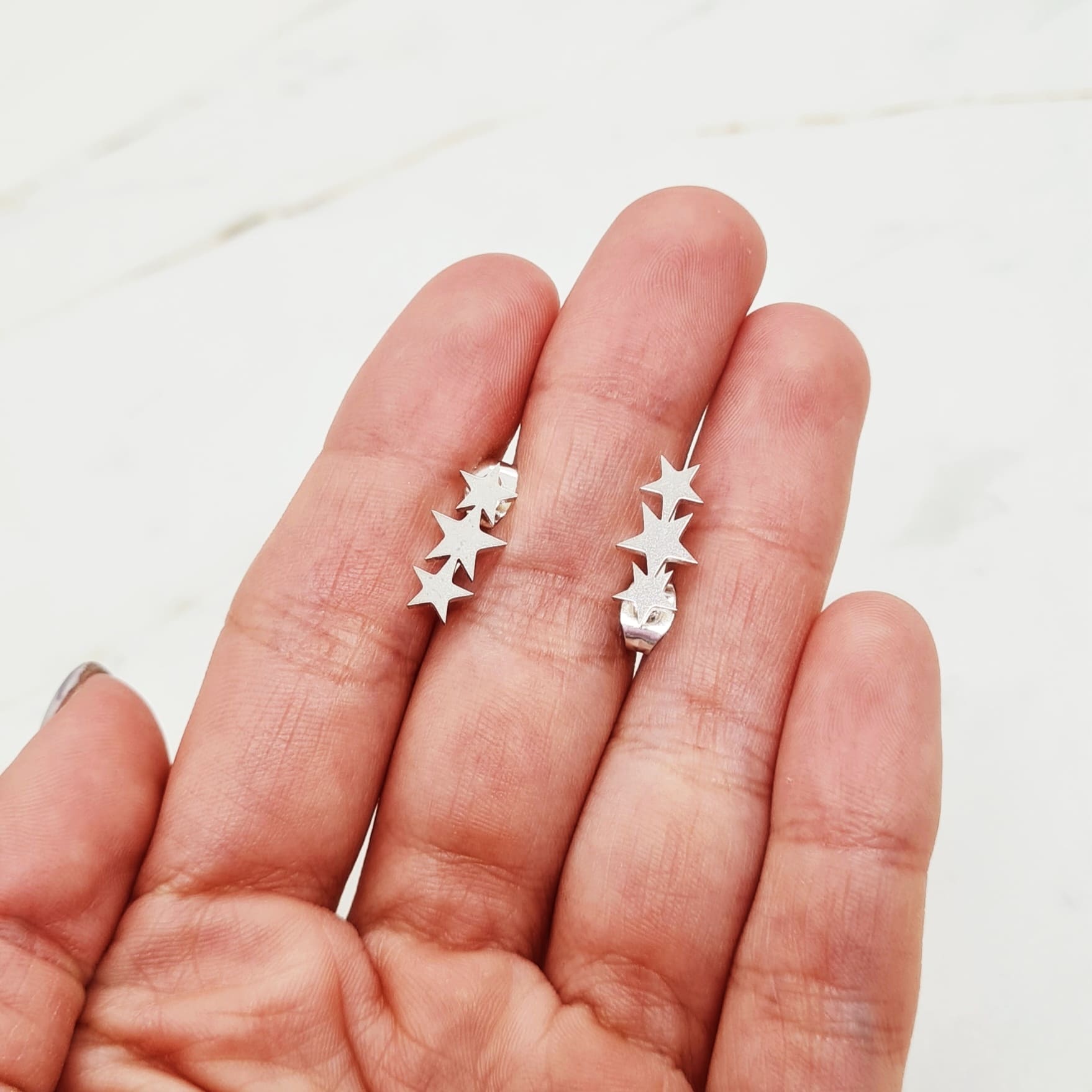 Imagen de producto AROS ACERO BLANCO GRANDE - ESTRELLAS LISAS