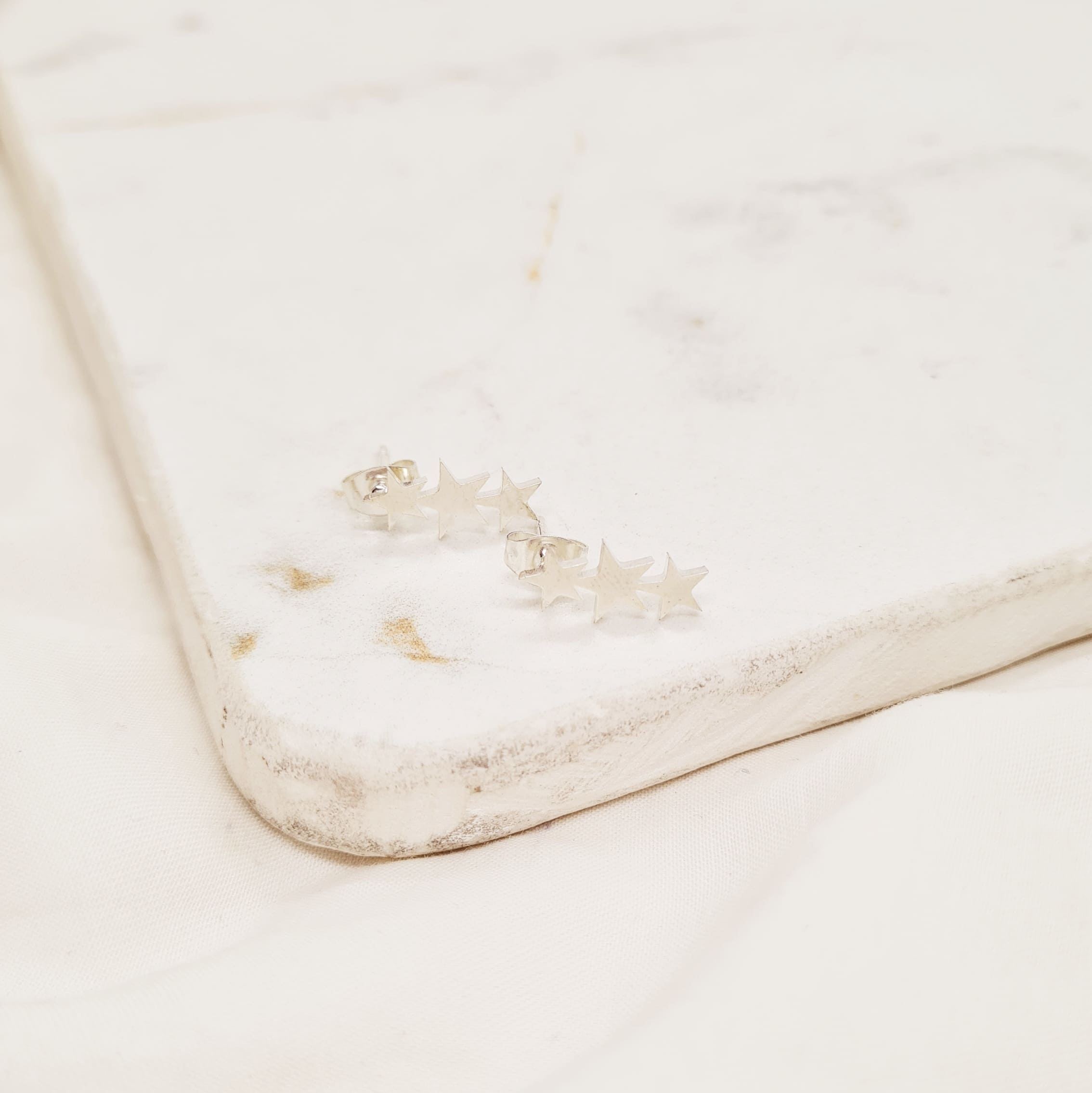 Imagen de producto AROS ACERO BLANCO GRANDE - ESTRELLAS LISAS