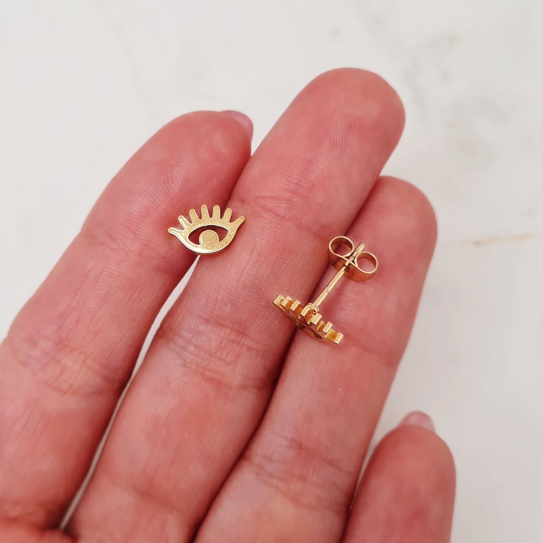 Imagen de producto AROS ACERO DORADO CALADO - OJO TURCO