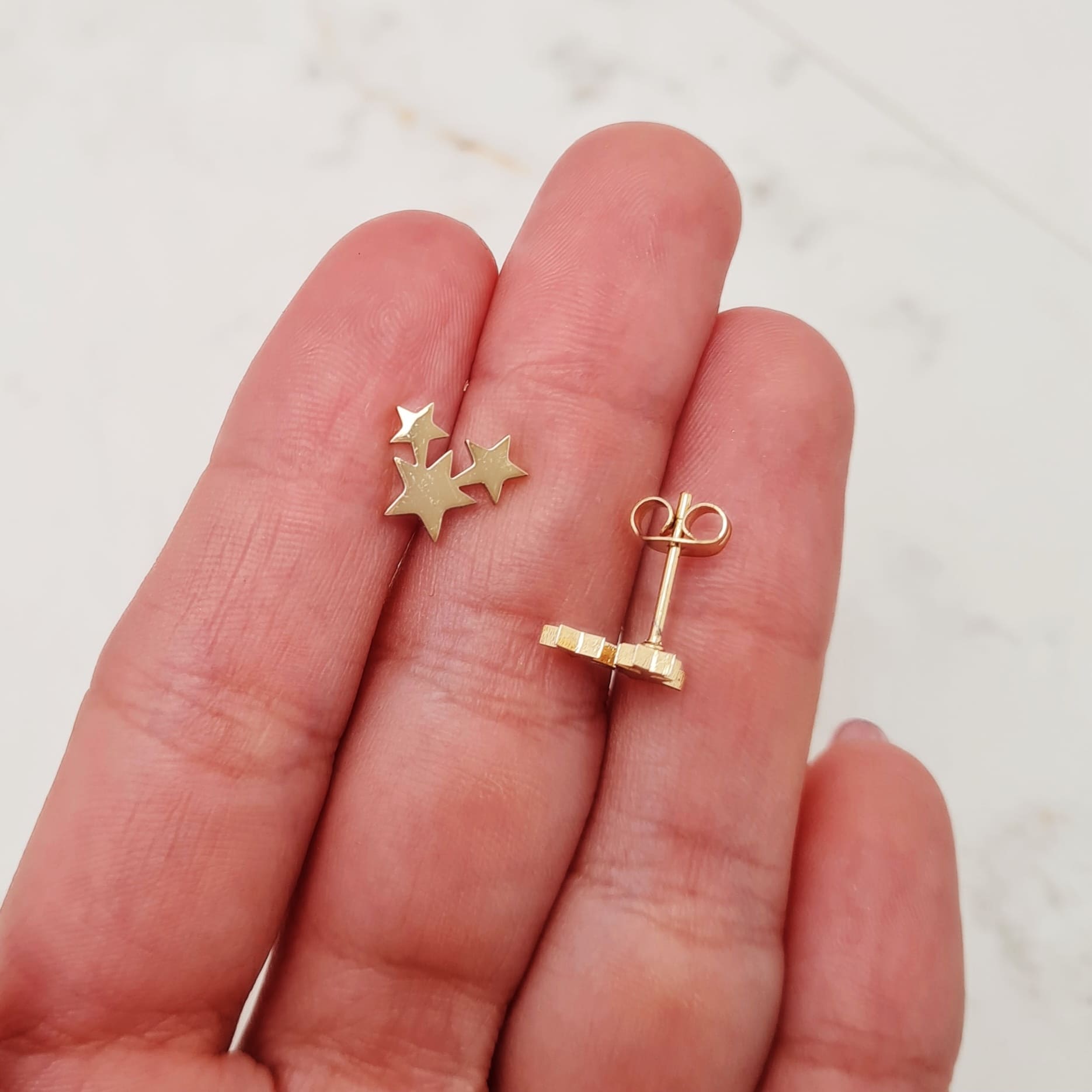Imagen de producto AROS ACERO DORADO CALADO - ESTRELLA TRIPLE