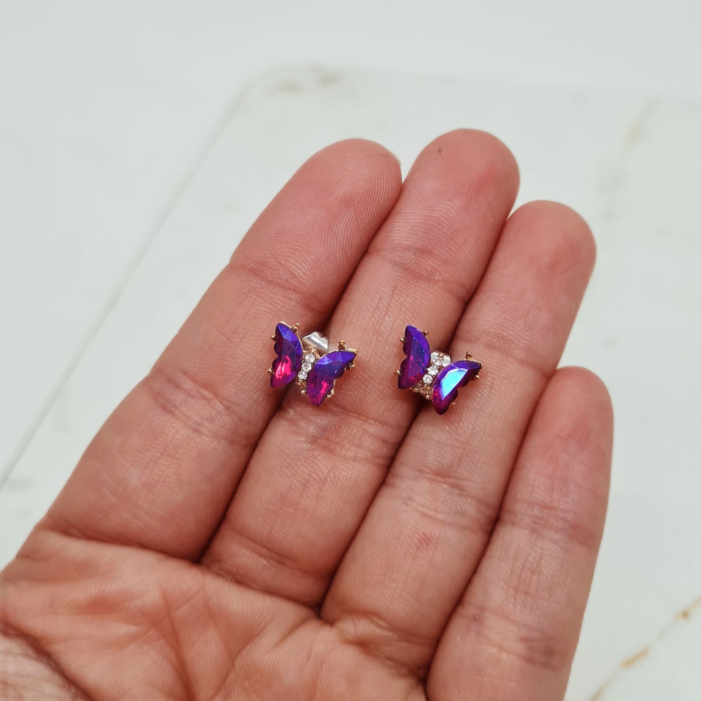 Imagen de producto AROS ACERO DORADO MARIPOSA ENGARZADA CHICA - VIOLETA