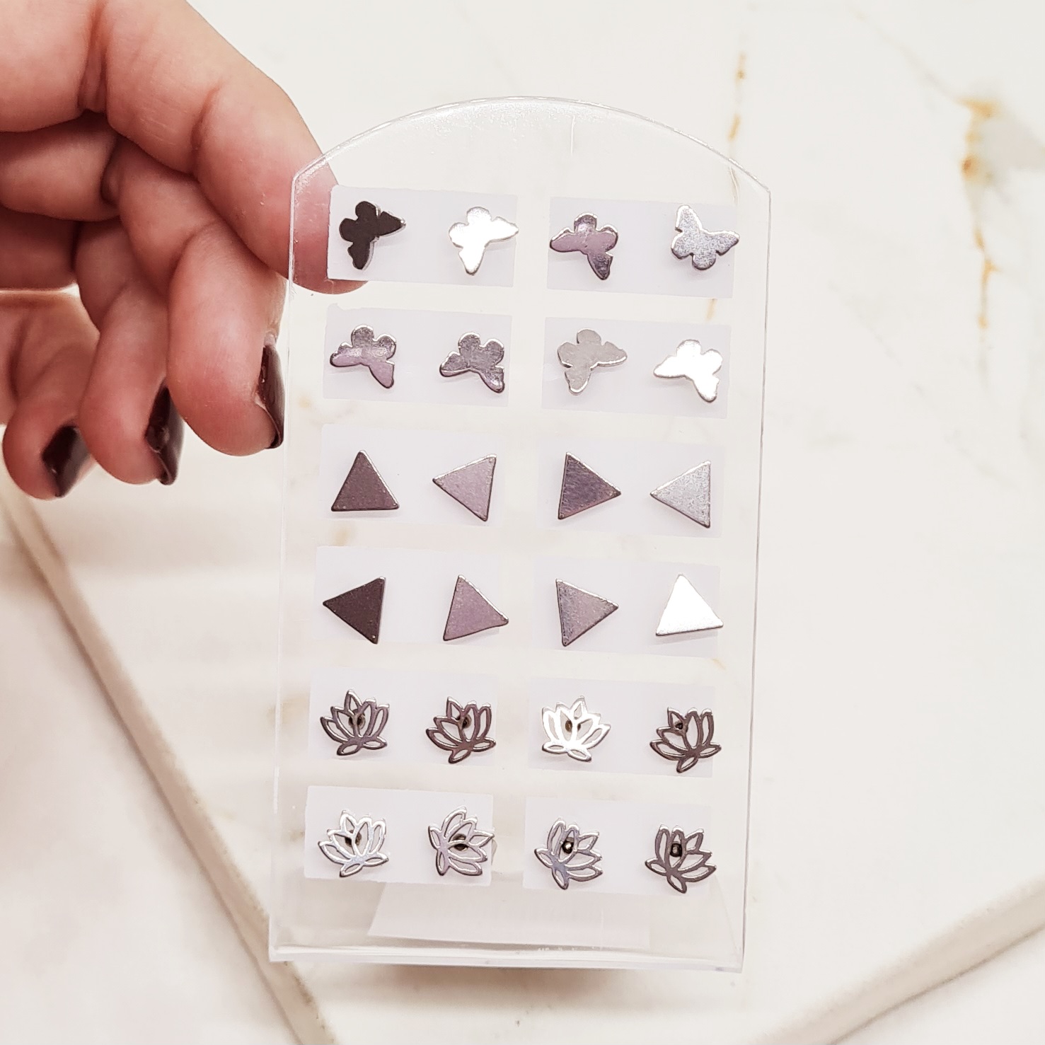 Imagen de producto BLISTER AROS SURTIDOS - MARIPOSA / TRIANGULO / FLOR DE LOTO