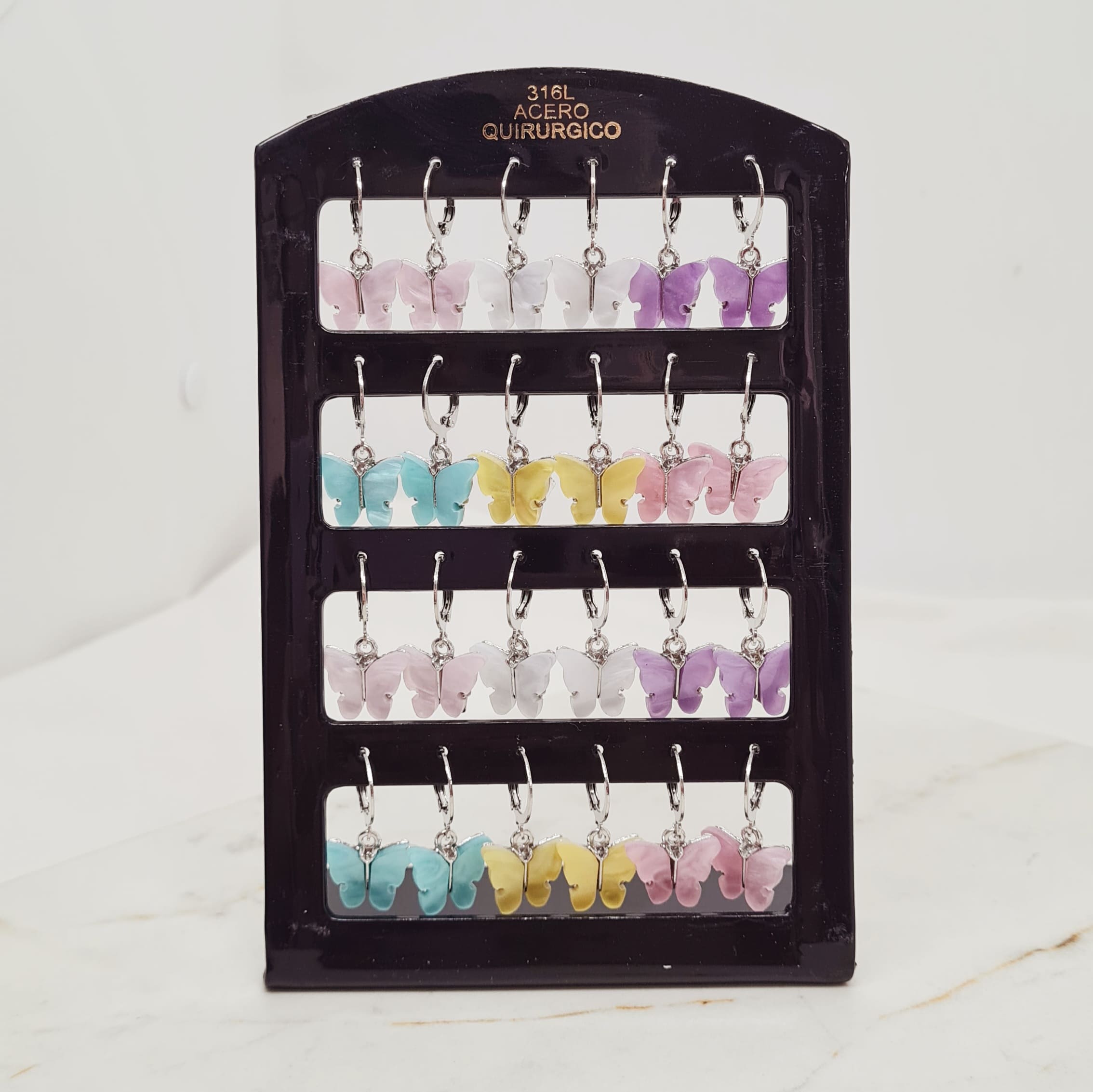 Imagen de producto BLISTER DE ARGOLLAS BRISURA CON MARIPOSA DE COLORES