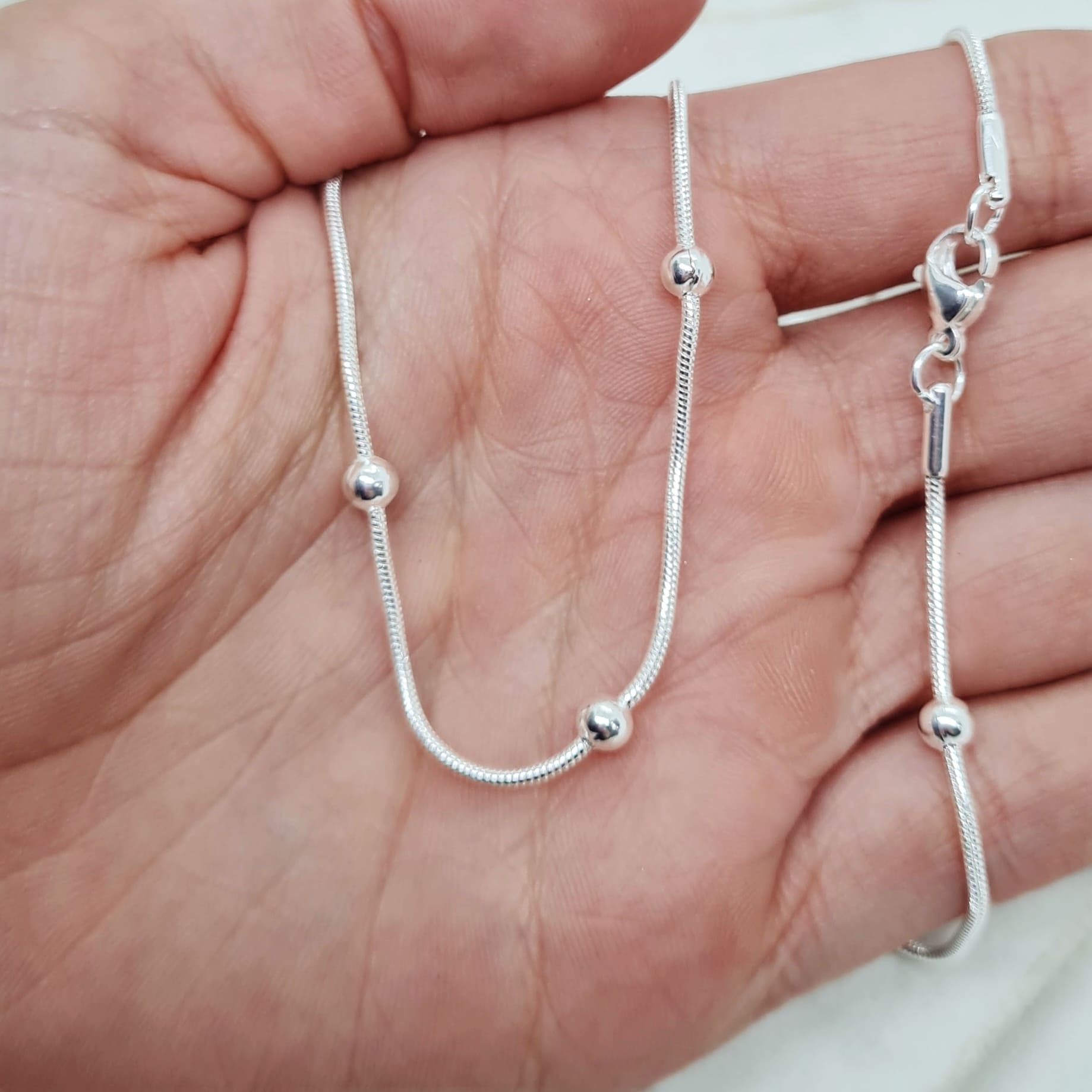Imagen de producto CADENA ACERO BLANCO COLITA DE RATA CON BOLITAS