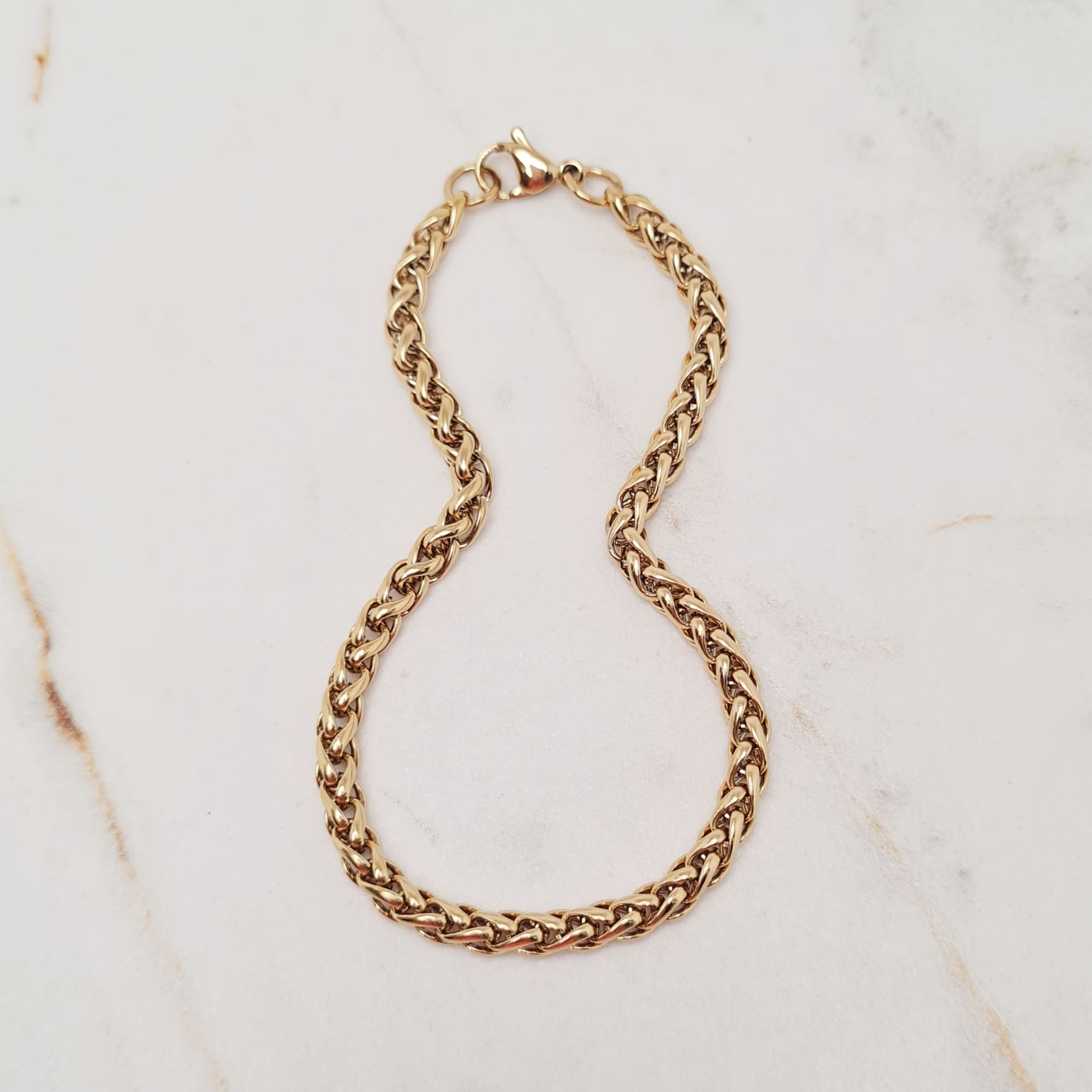 Imagen de producto PULSERA ACERO DORADO ESPIGA 4 mm
