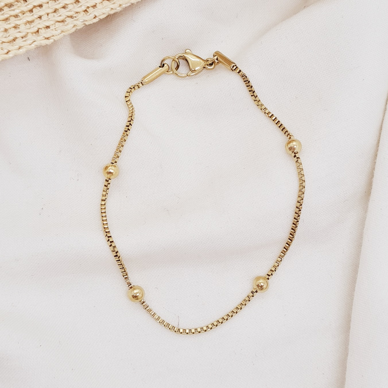 Imagen de producto PULSERA ACERO DORADO VENECIANA CERRADA CON BOLITAS