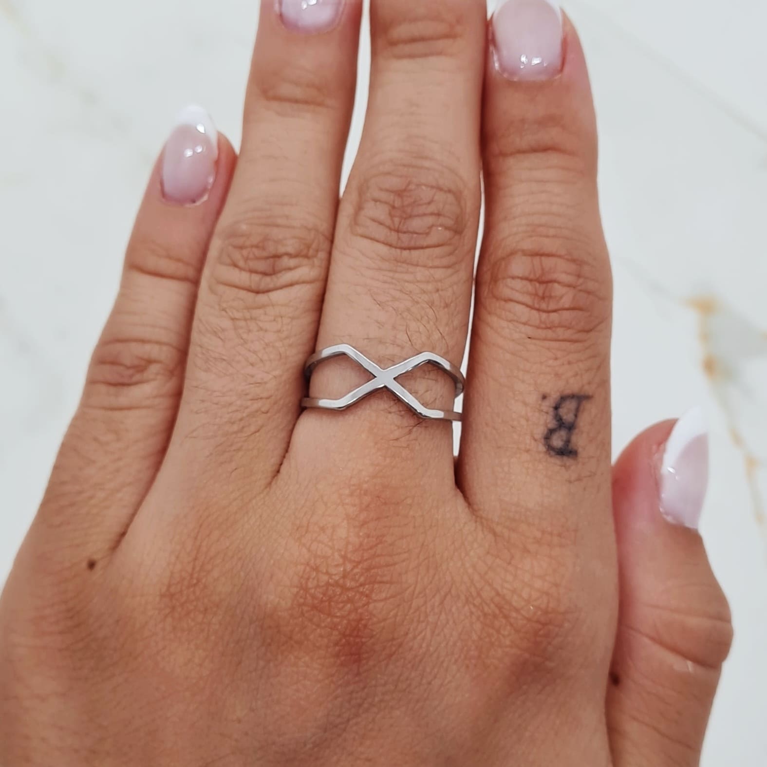 Imagen de producto ANILLO DOBLE LINEA CRUZADAS