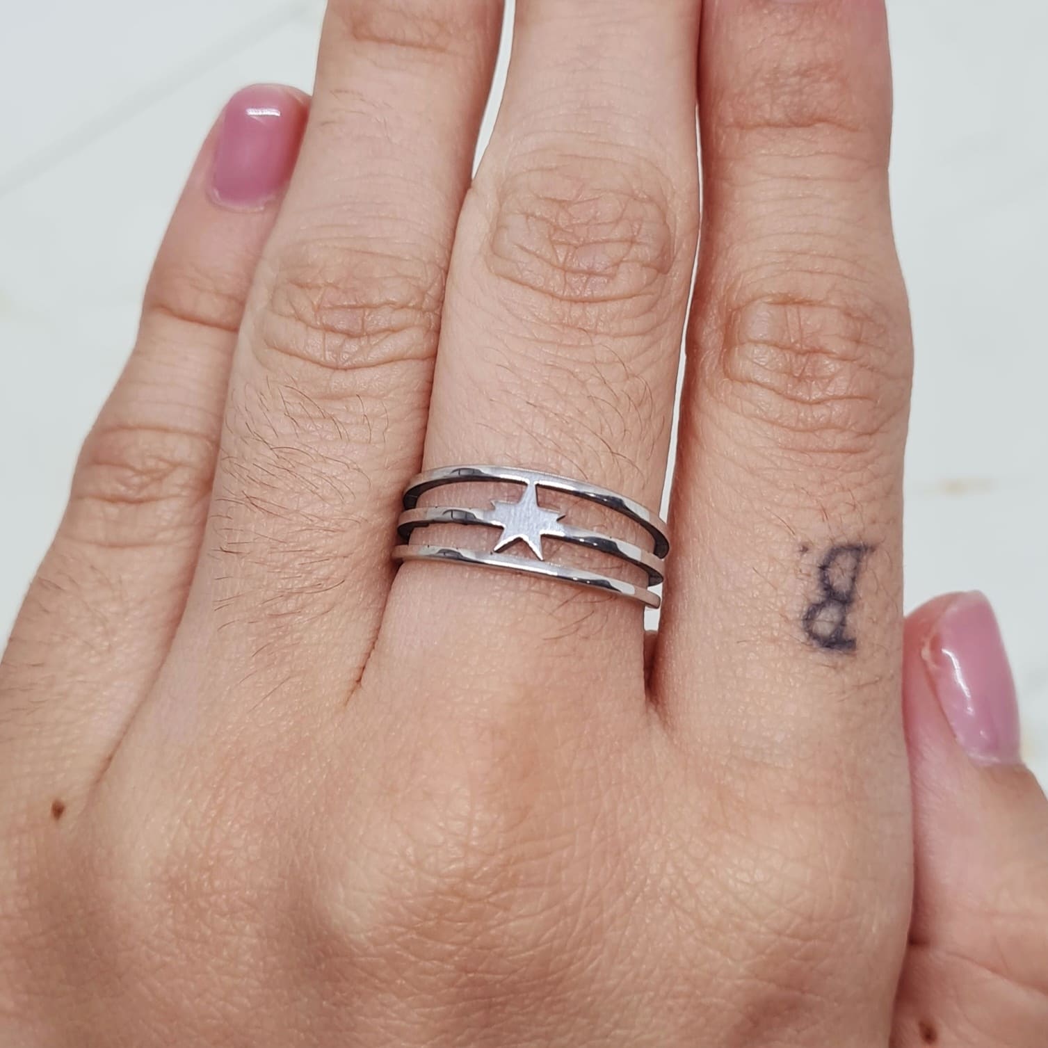 Imagen de producto ANILLO TRIPLE LINEA CON ESTRELLA