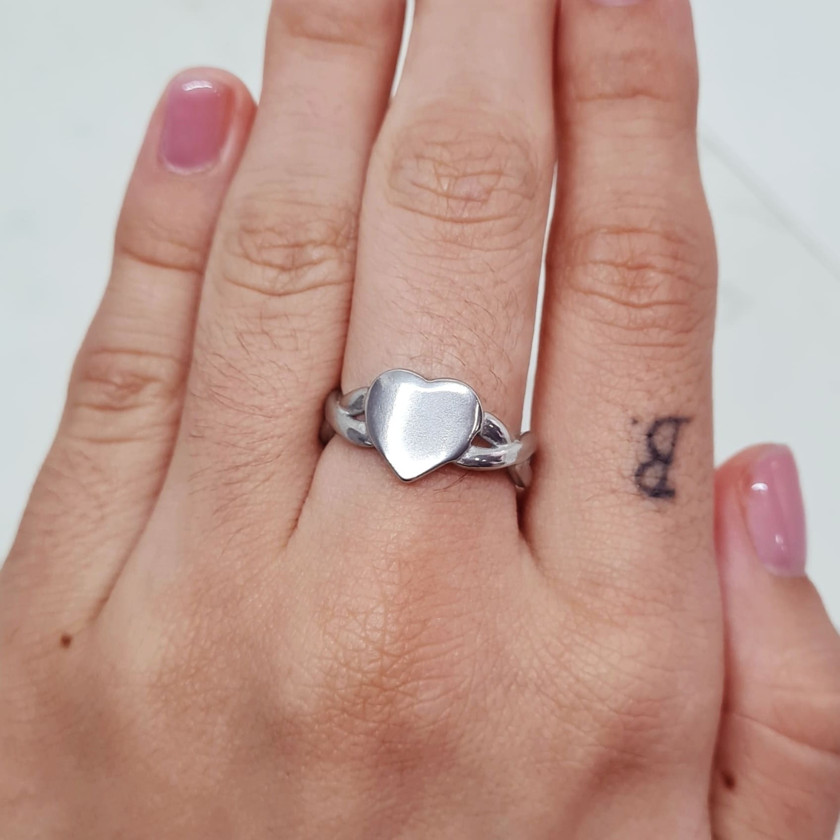 Imagen de producto ANILLO MACIZO - CORAZON CON LINEAS QUE CRUZAN