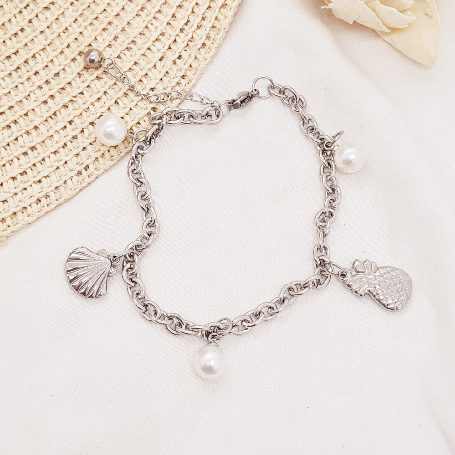 Imagen de producto PULSERA TIFFANY CON DIJE - ALMEJA/PIÑA Y PERLAS