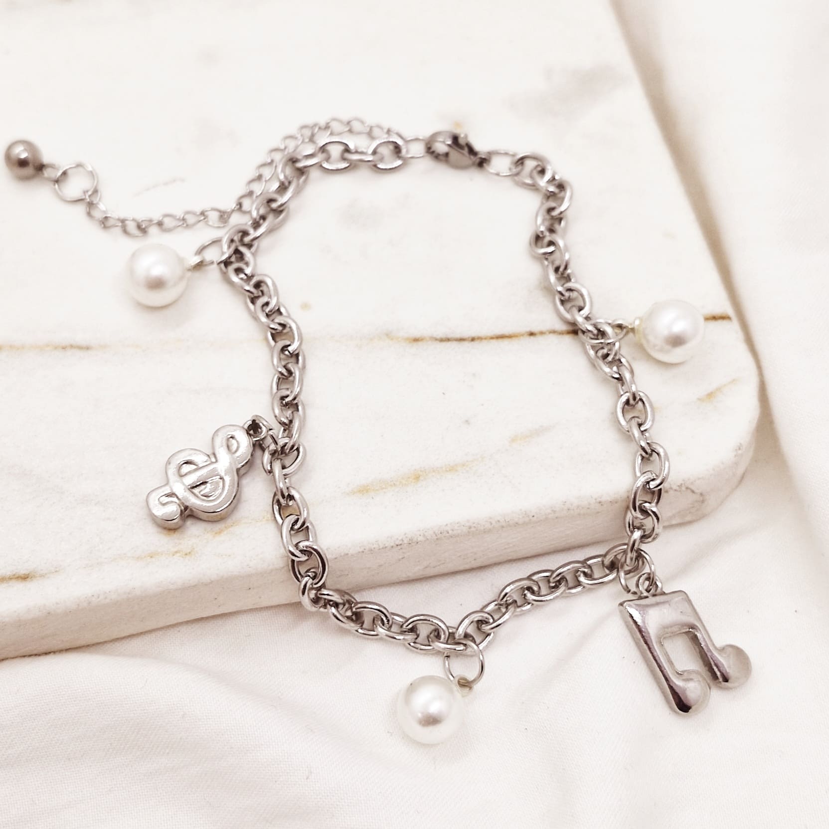 Imagen de producto PULSERA TIFFANY CON DIJE - MUSICAL