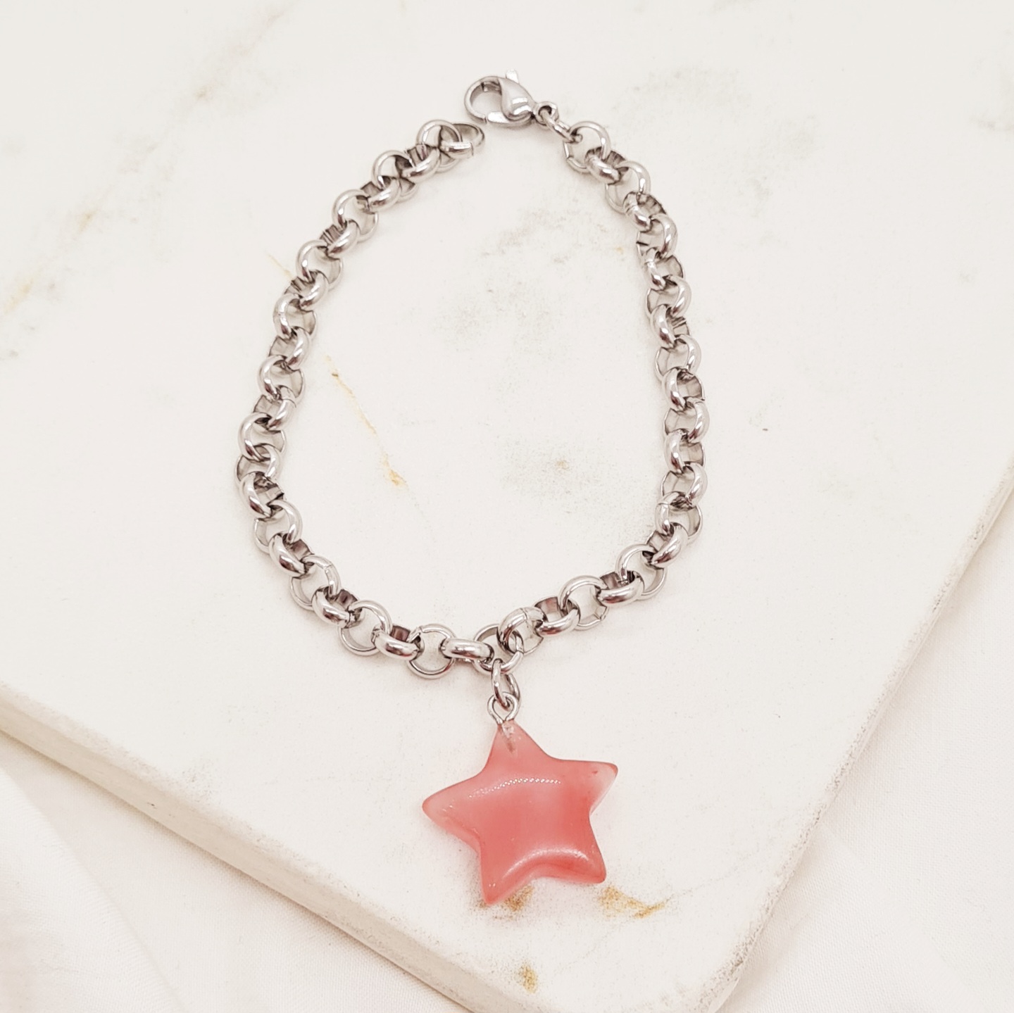 Imagen de producto PULSERA CON DIJE PIEDRA CUARZO FRAMBUESA - ESTRELLA
