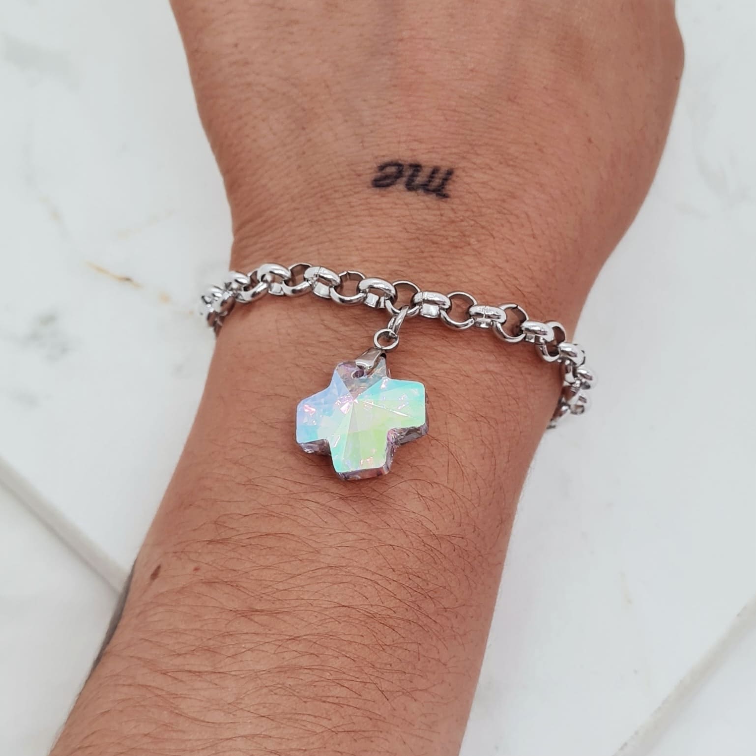 Imagen de producto PULSERA CON DIJE CRISTAL - CRUZ TORNASOL CLARO OPACO