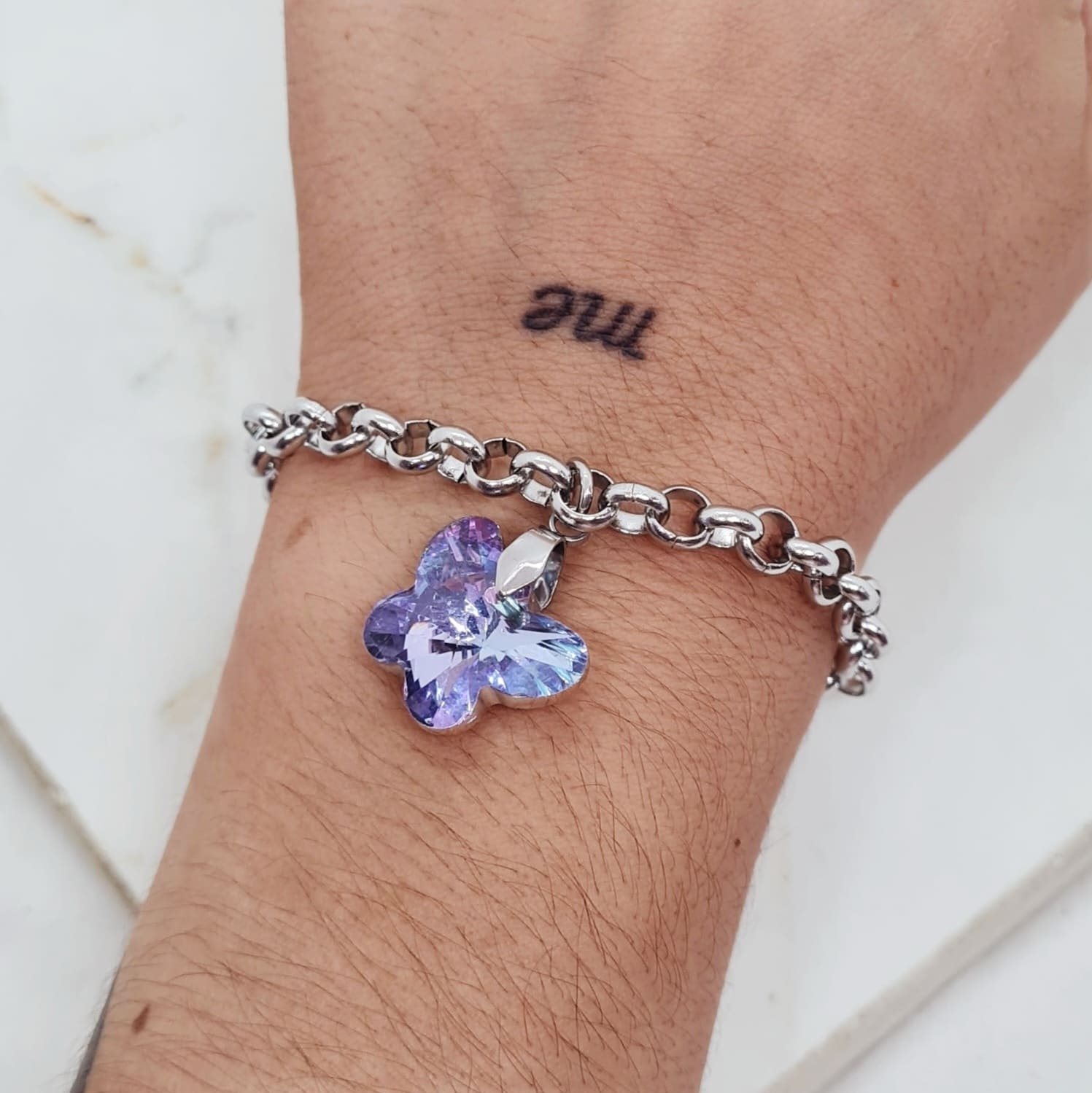 Imagen de producto PULSERA CON DIJE CRISTAL - MARIPOSA CELESTE/VIOLETA