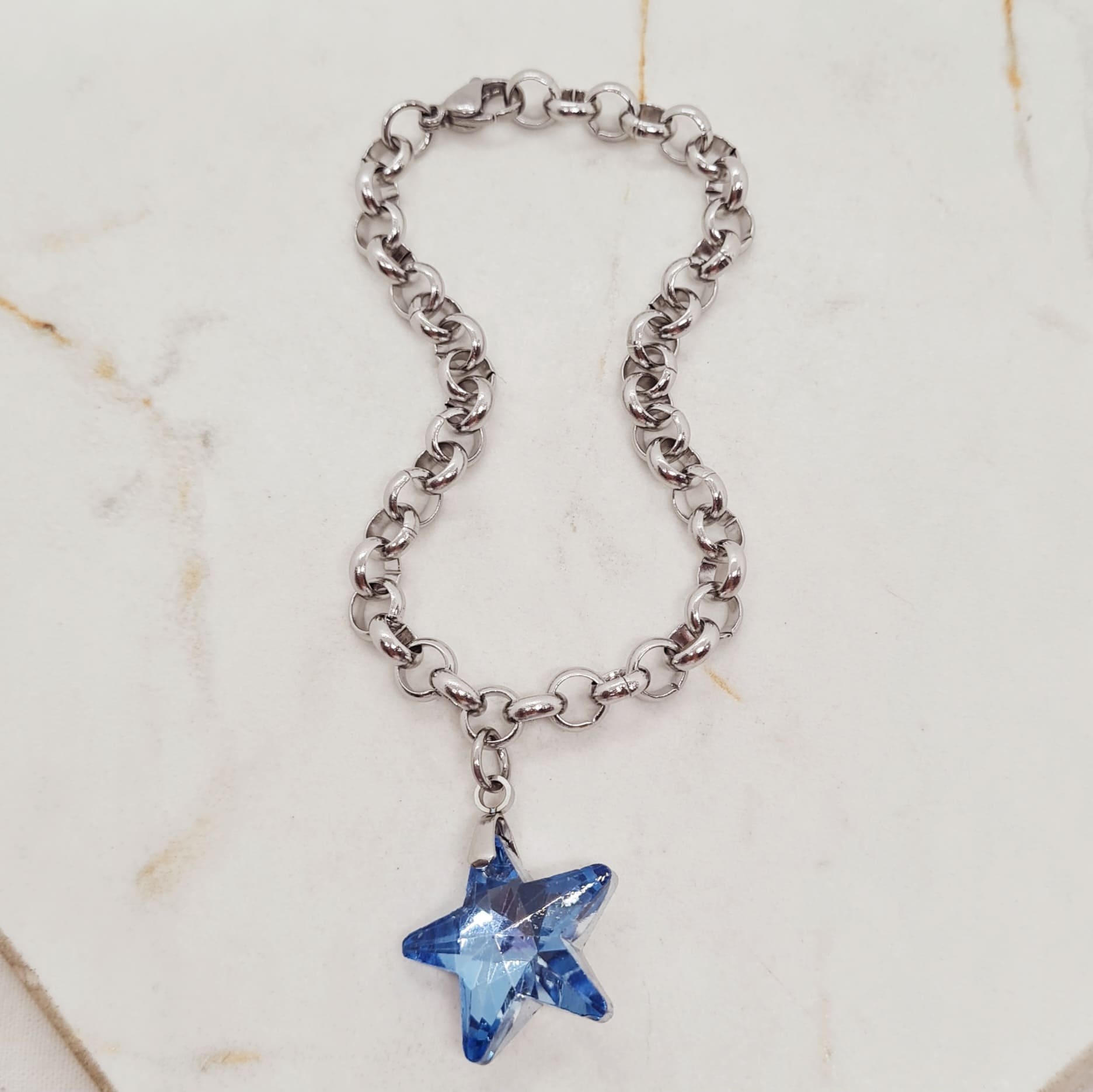 Imagen de producto PULSERA CON DIJE CRISTAL - ESTRELLA CELESTE
