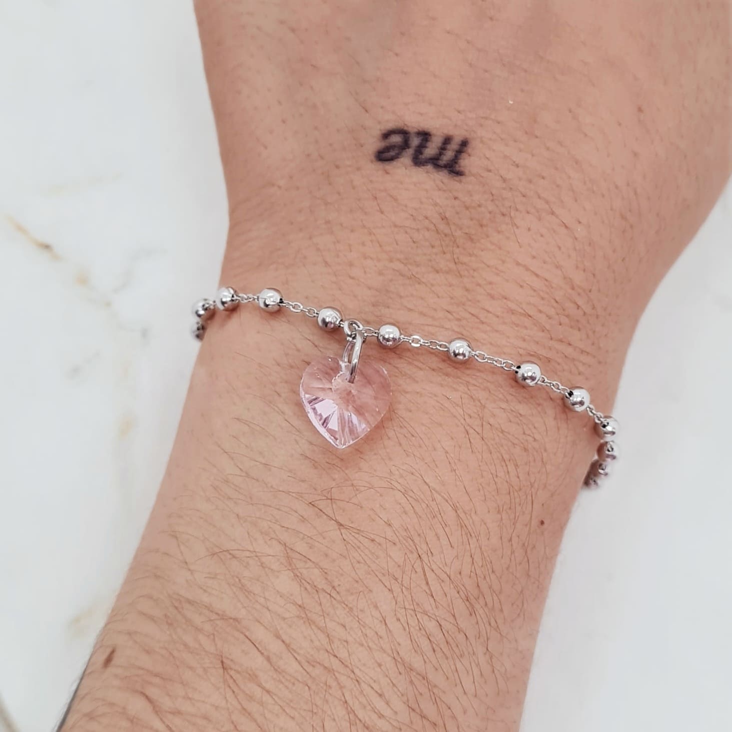 Imagen de producto PULSERA CON BOLITAS Y CRISTAL CORAZON CHICO - ROSA