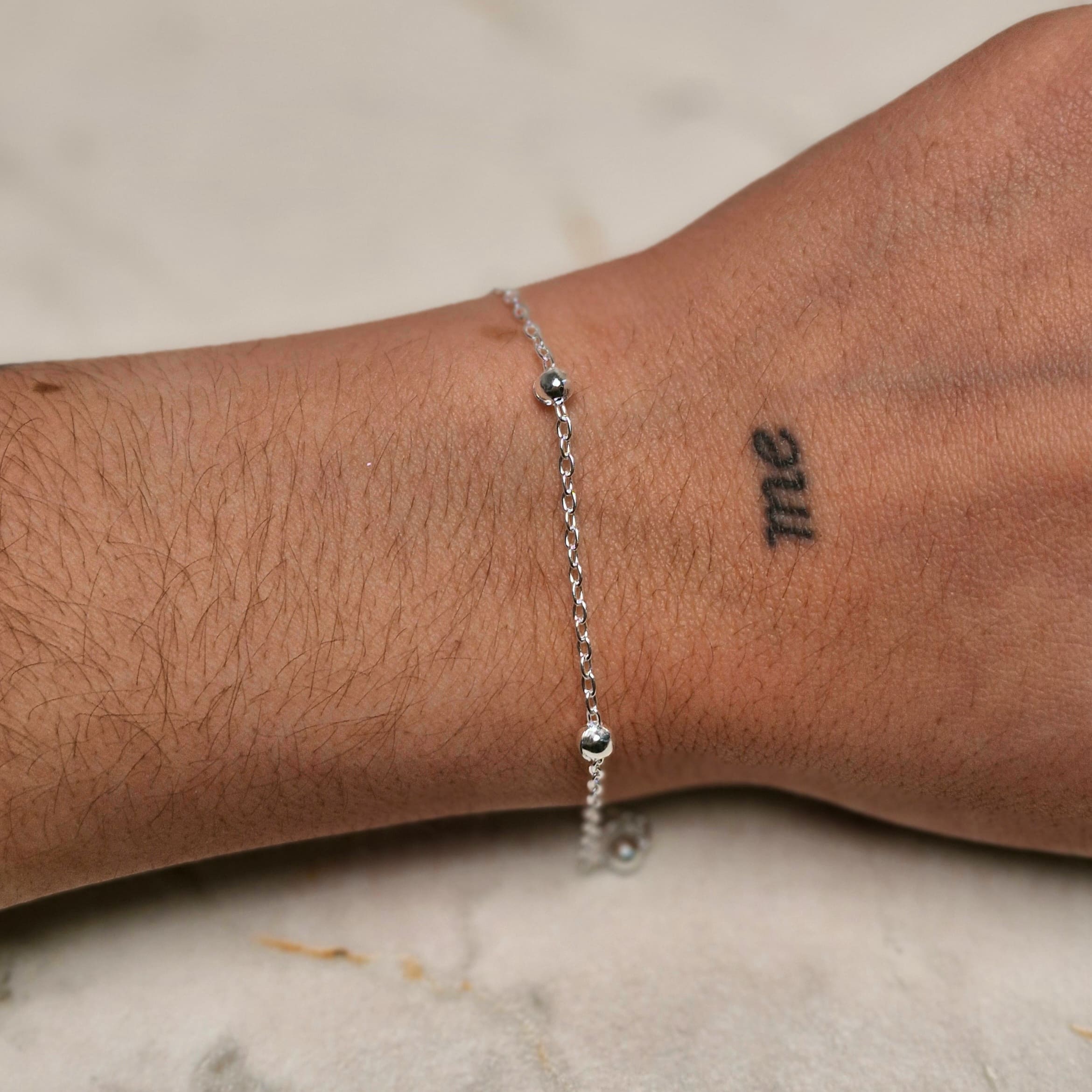 Imagen de producto PULSERA ACERO BLANCO FINA CON BOLITAS