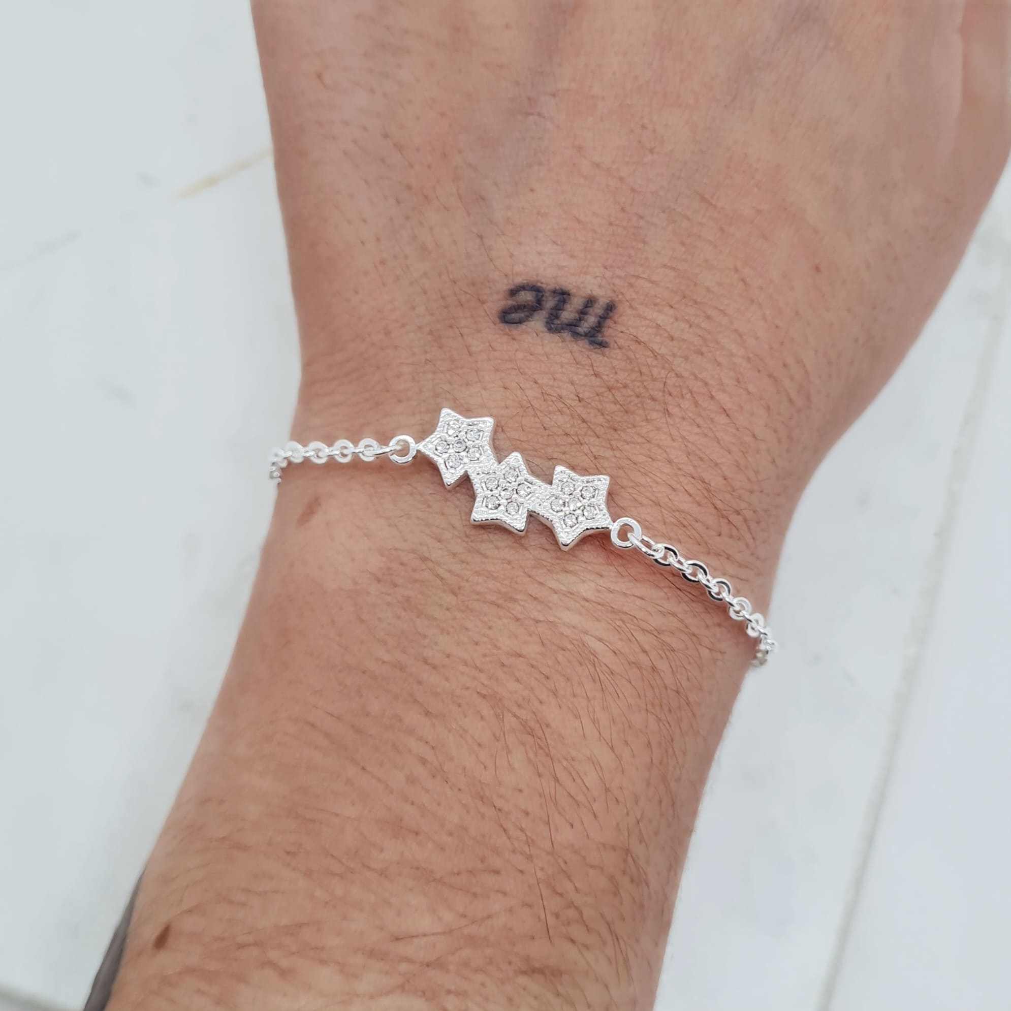 Imagen de producto PULSERA ACERO BLANCO CON DIJE - TRIPLE ESTRELLA STRASS BLANCOS