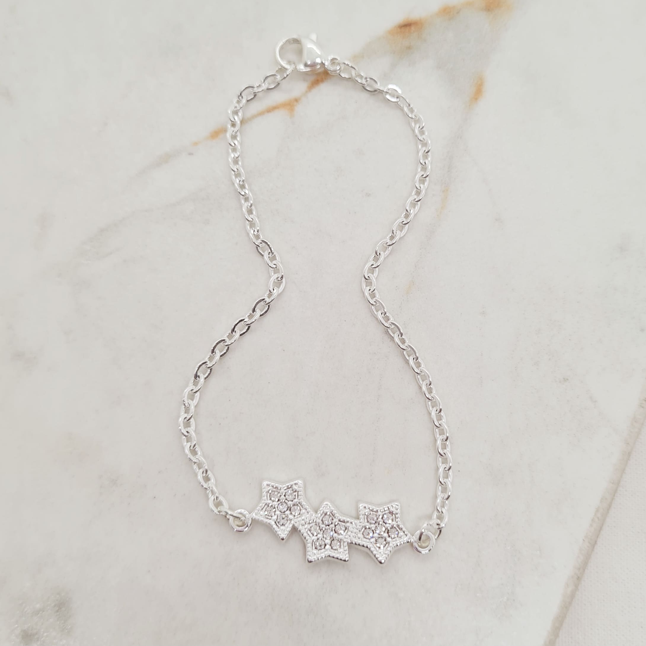 Imagen de producto PULSERA ACERO BLANCO CON DIJE - TRIPLE ESTRELLA STRASS BLANCOS