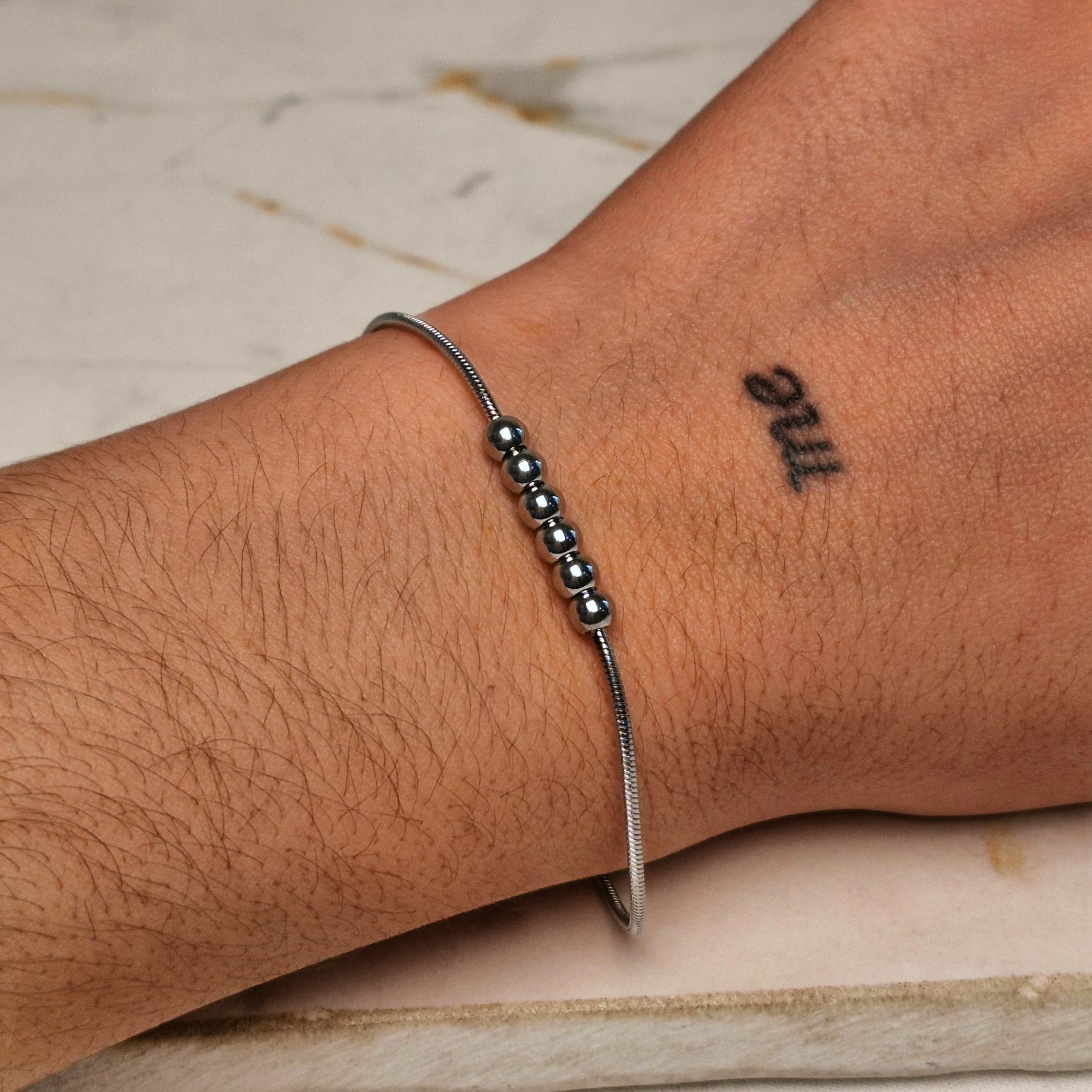 Imagen de producto PULSERA COLITA DE RATA CON 6 BOLITAS JUNTAS
