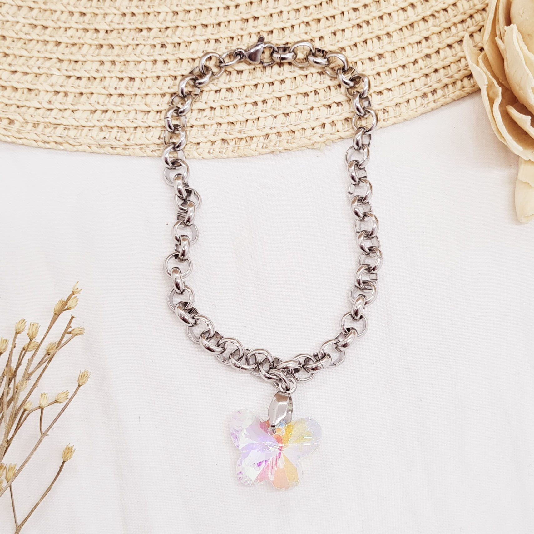 Imagen de producto PULSERA CON DIJE CRISTAL - MARIPOSA TORNASOLADA CLARA