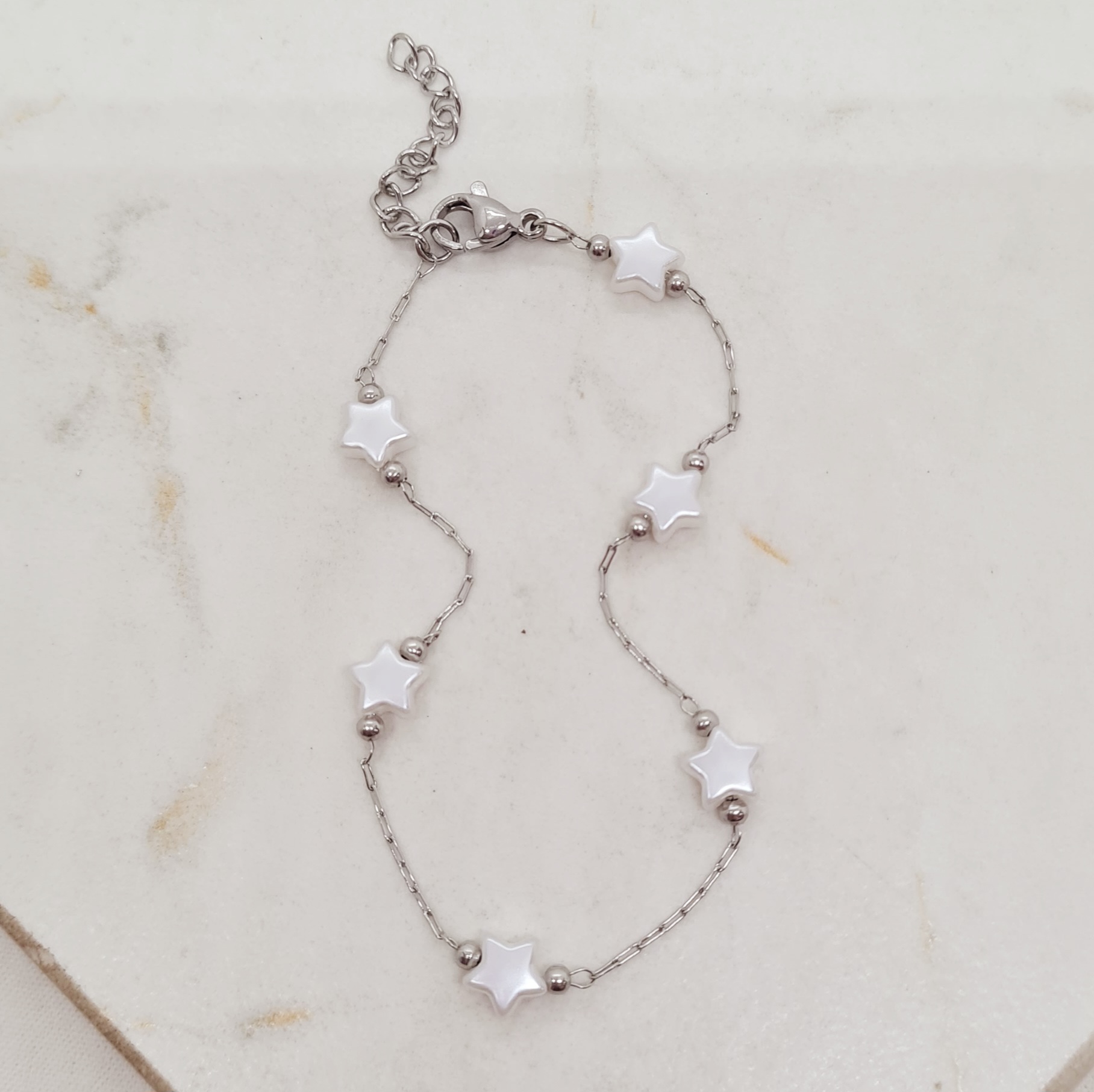 Imagen de producto PULSERA FINA CON BOLITAS Y PERLITAS ESTRELLAS