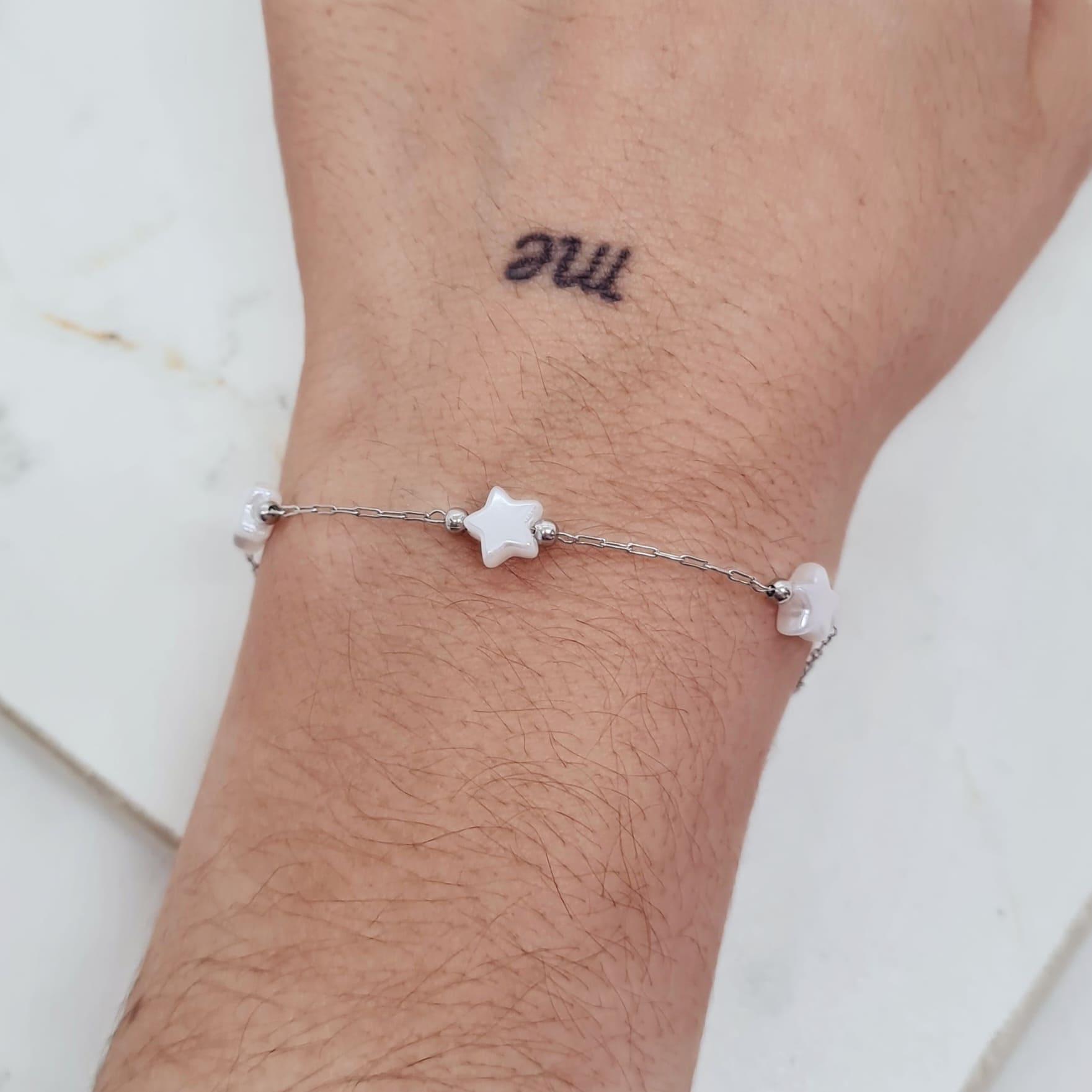 Imagen de producto PULSERA FINA CON BOLITAS Y PERLITAS ESTRELLAS