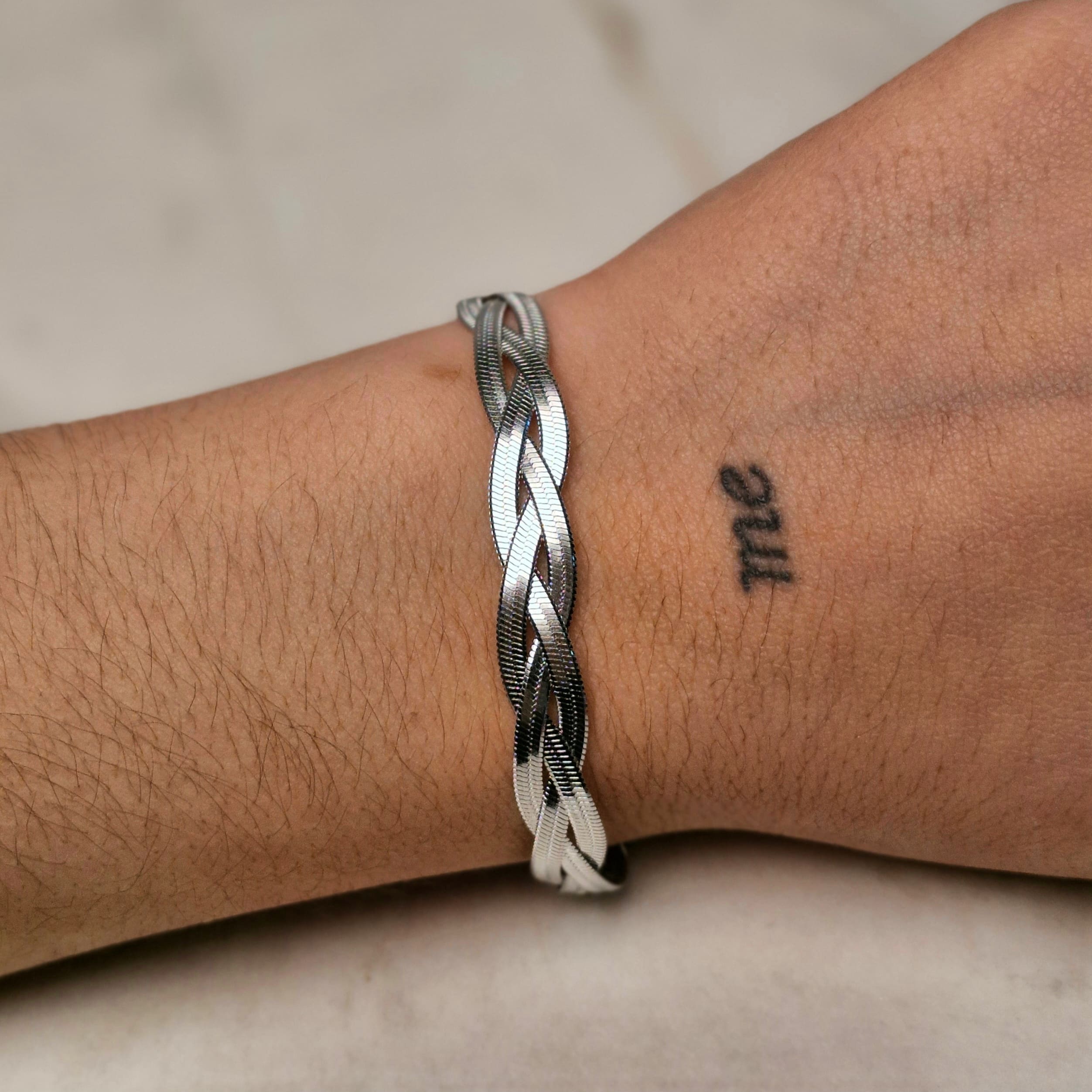 Imagen de producto PULSERA TRIPLE SERPIENTE TRENZADA