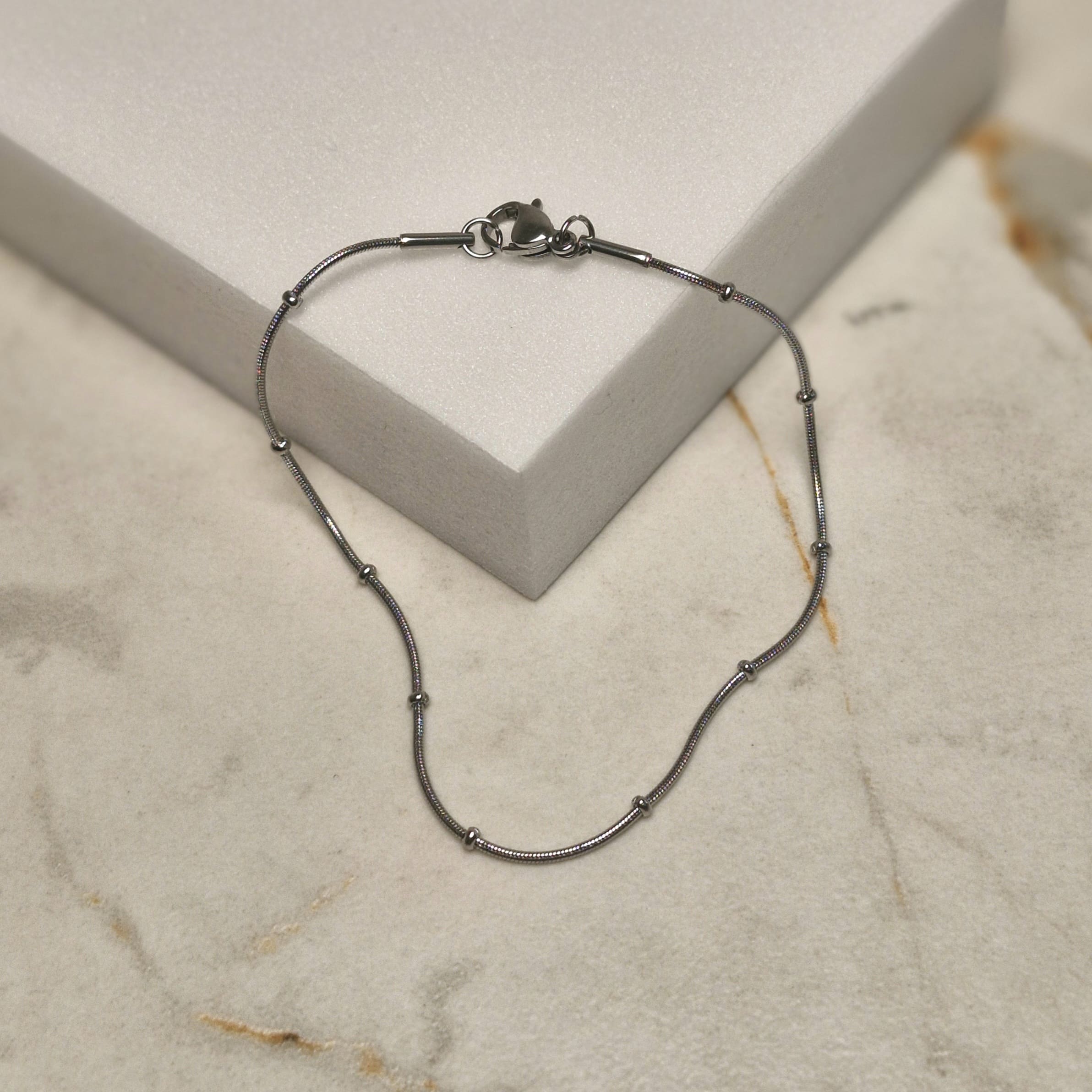 Imagen de producto PULSERA COLITA DE RATA FINA CON BOLITAS CHICAS