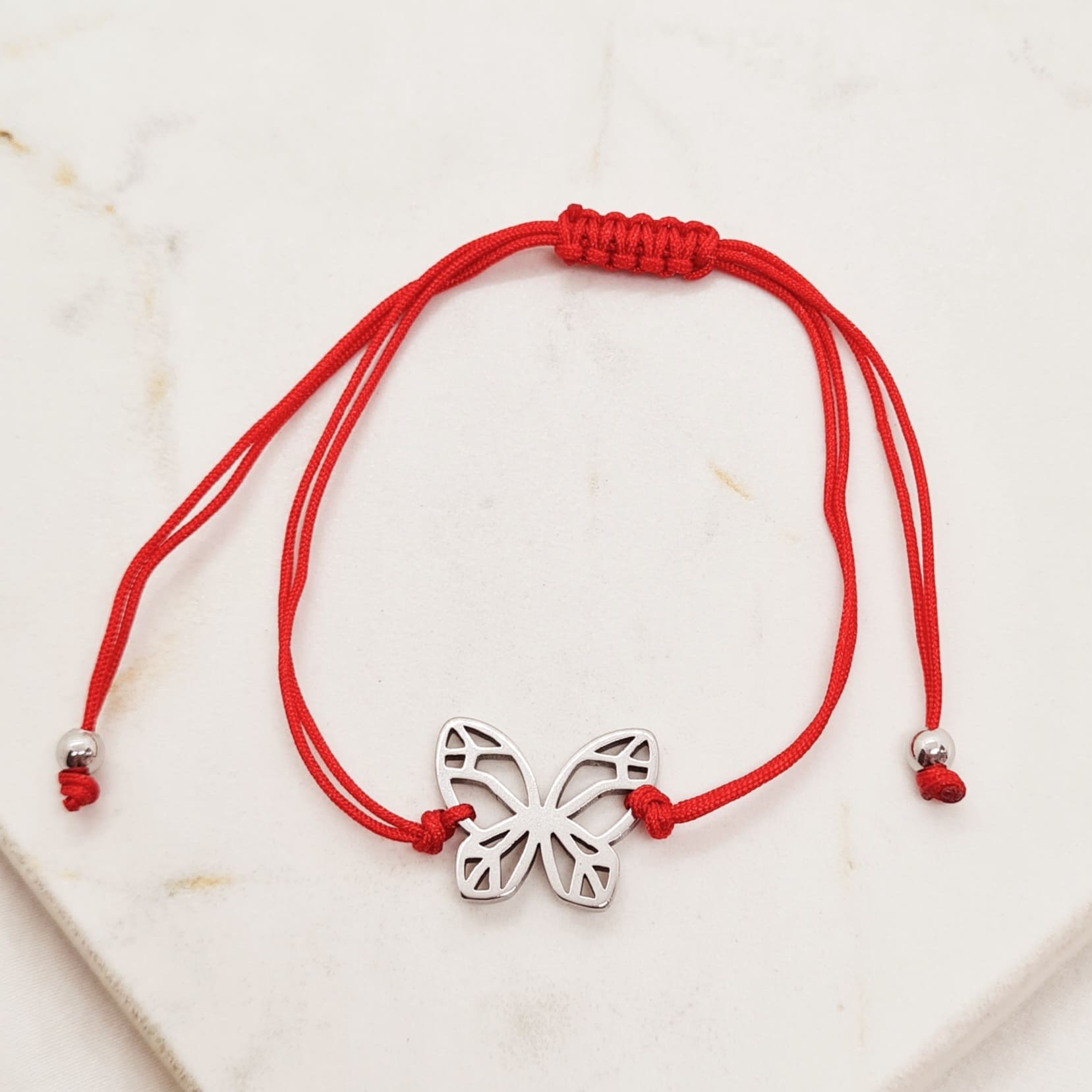 Imagen de producto PULSERA DE HILO ROJO - MARIPOSA