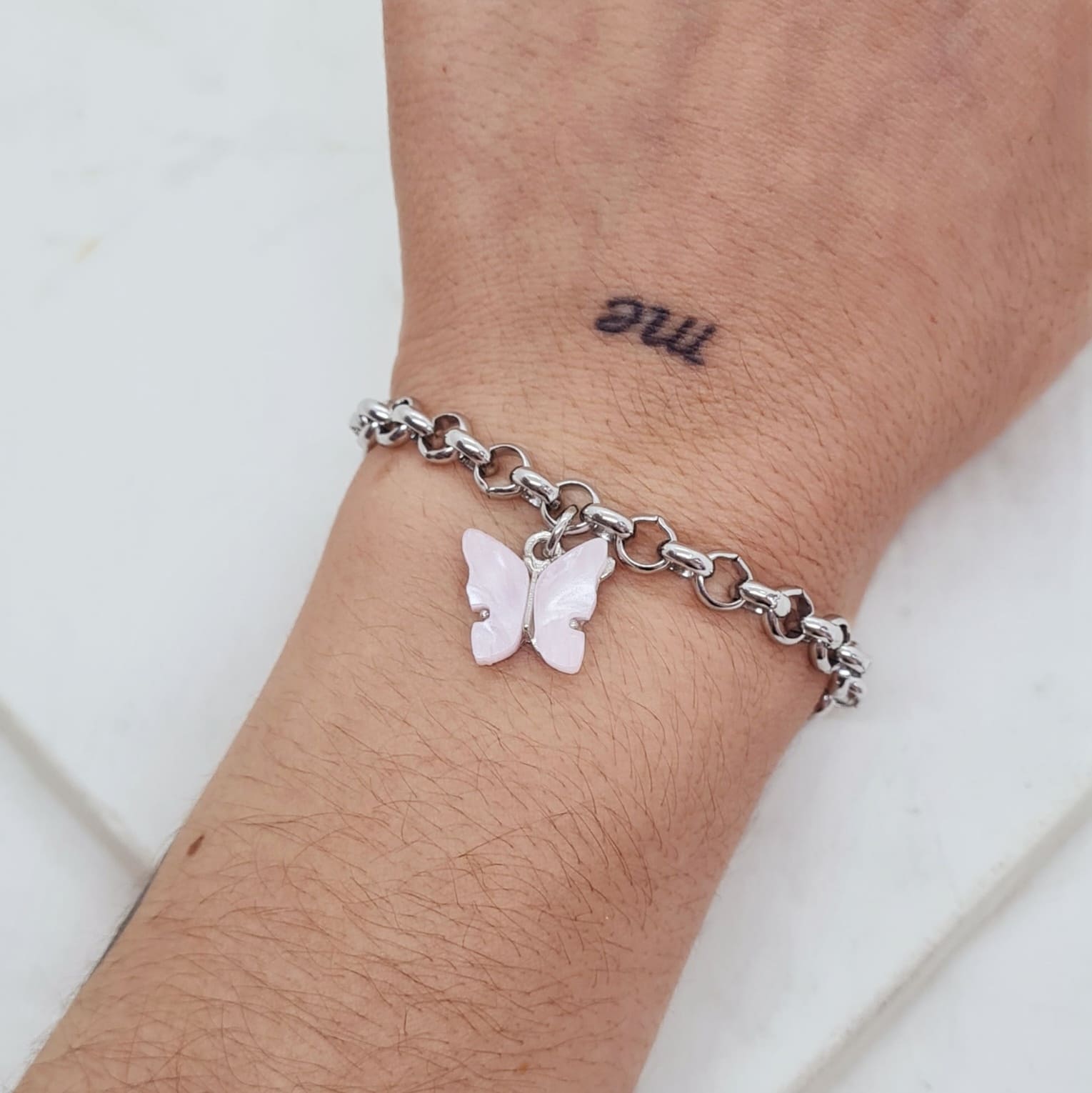 Imagen de producto PULSERA CON DIJE MARIPOSA - ROSA CLARO