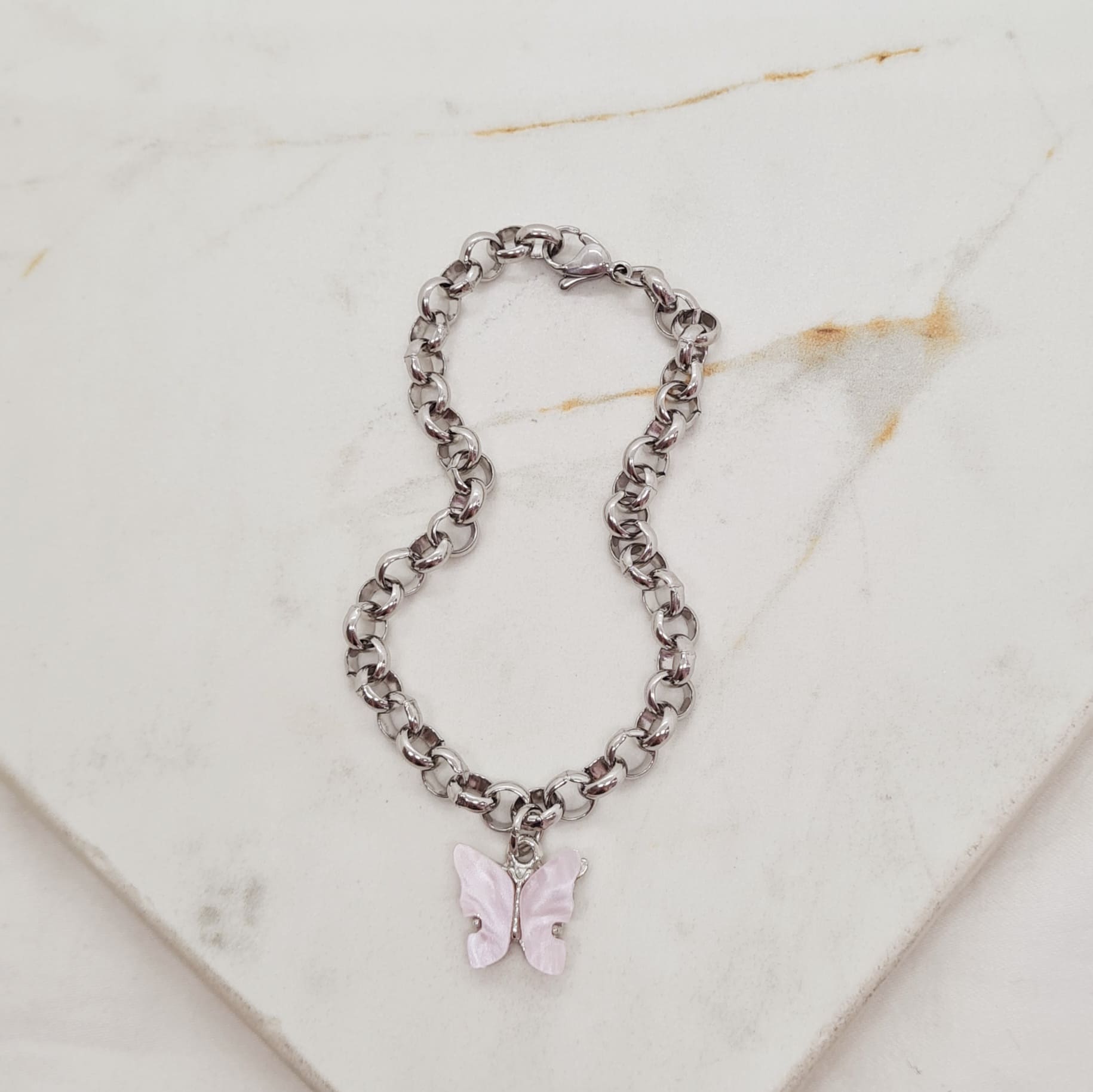 Imagen de producto PULSERA CON DIJE MARIPOSA - ROSA CLARO