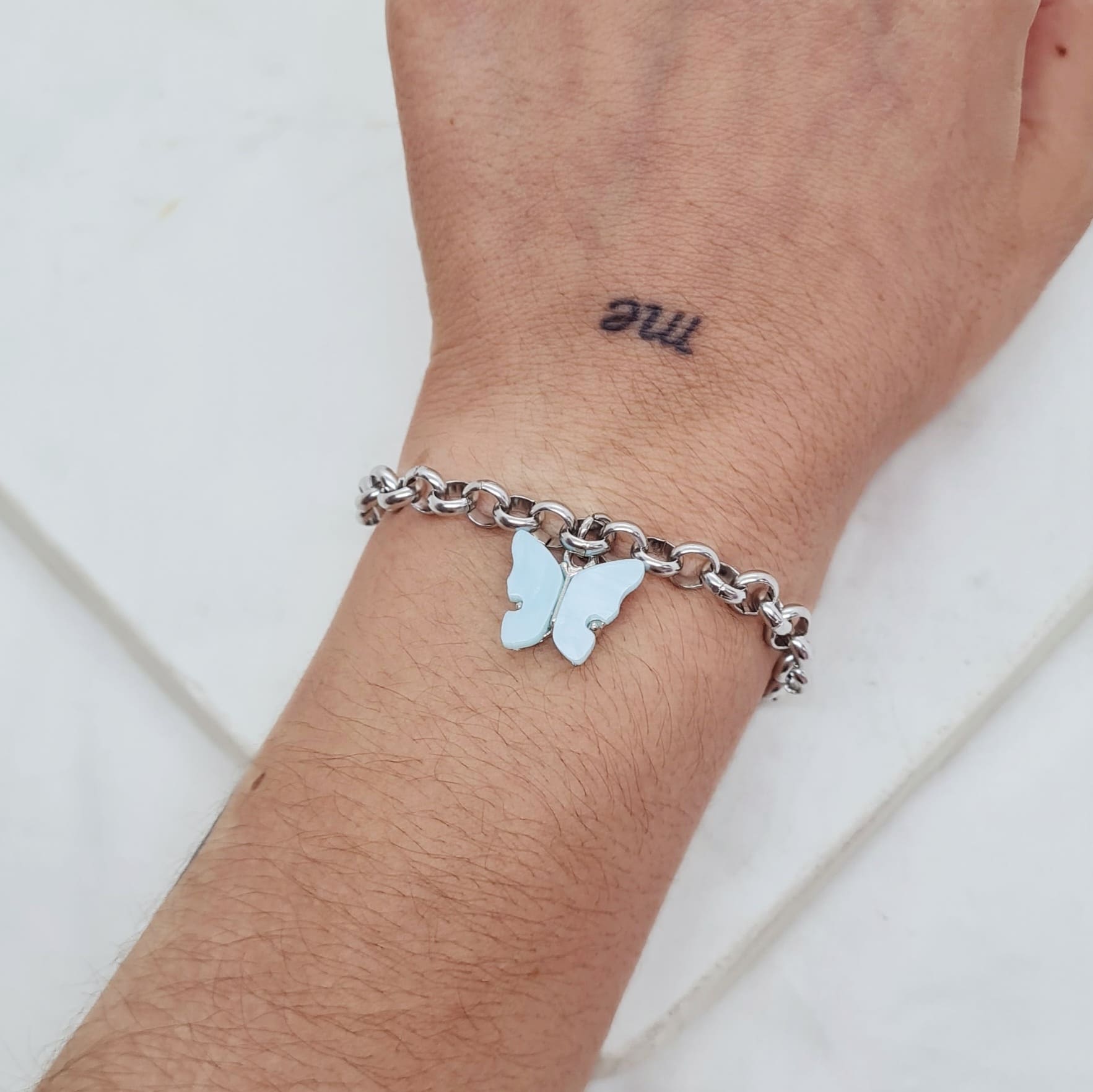 Imagen de producto PULSERA CON DIJE MARIPOSA - CELESTE