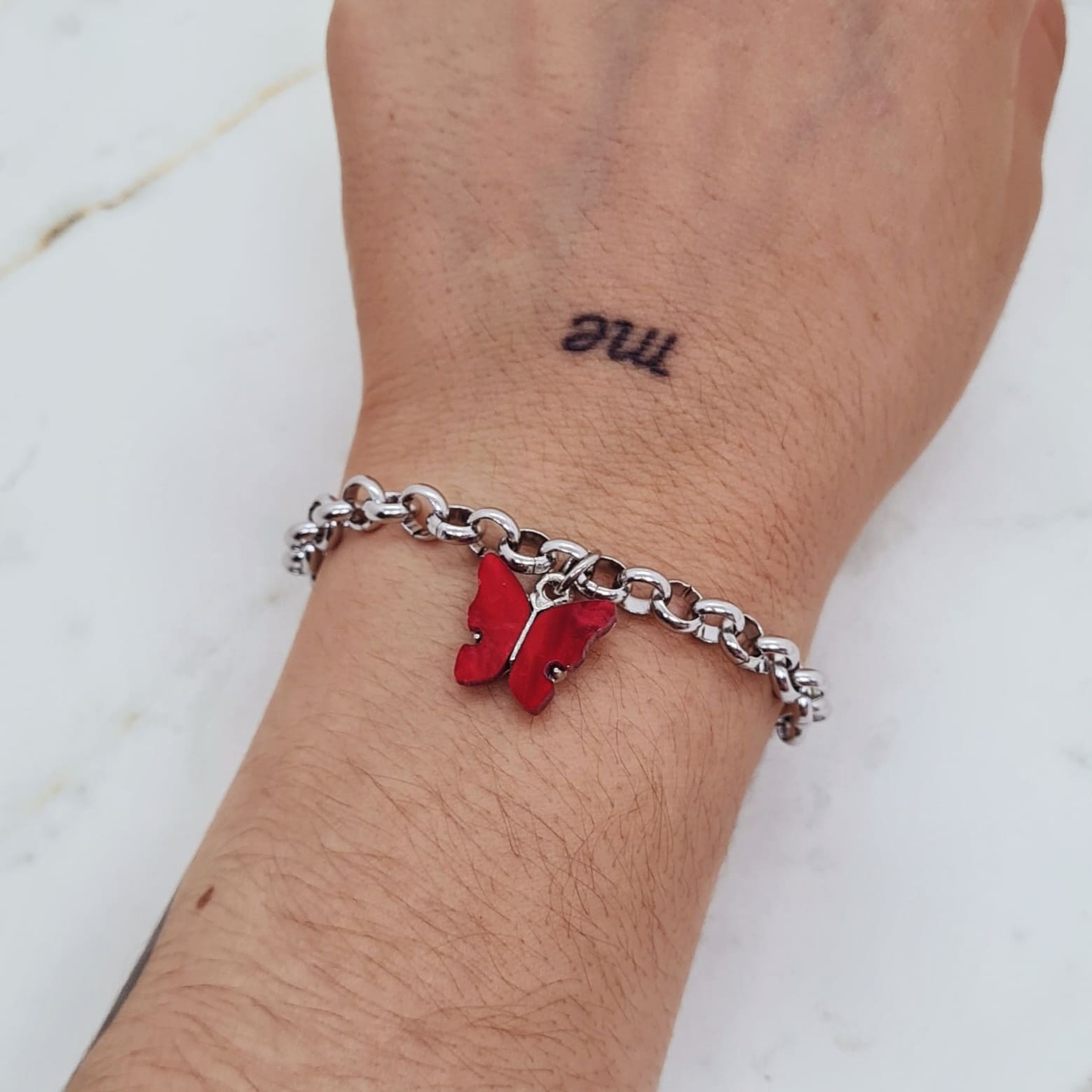 Imagen de producto PULSERA CON DIJE MARIPOSA - ROJA