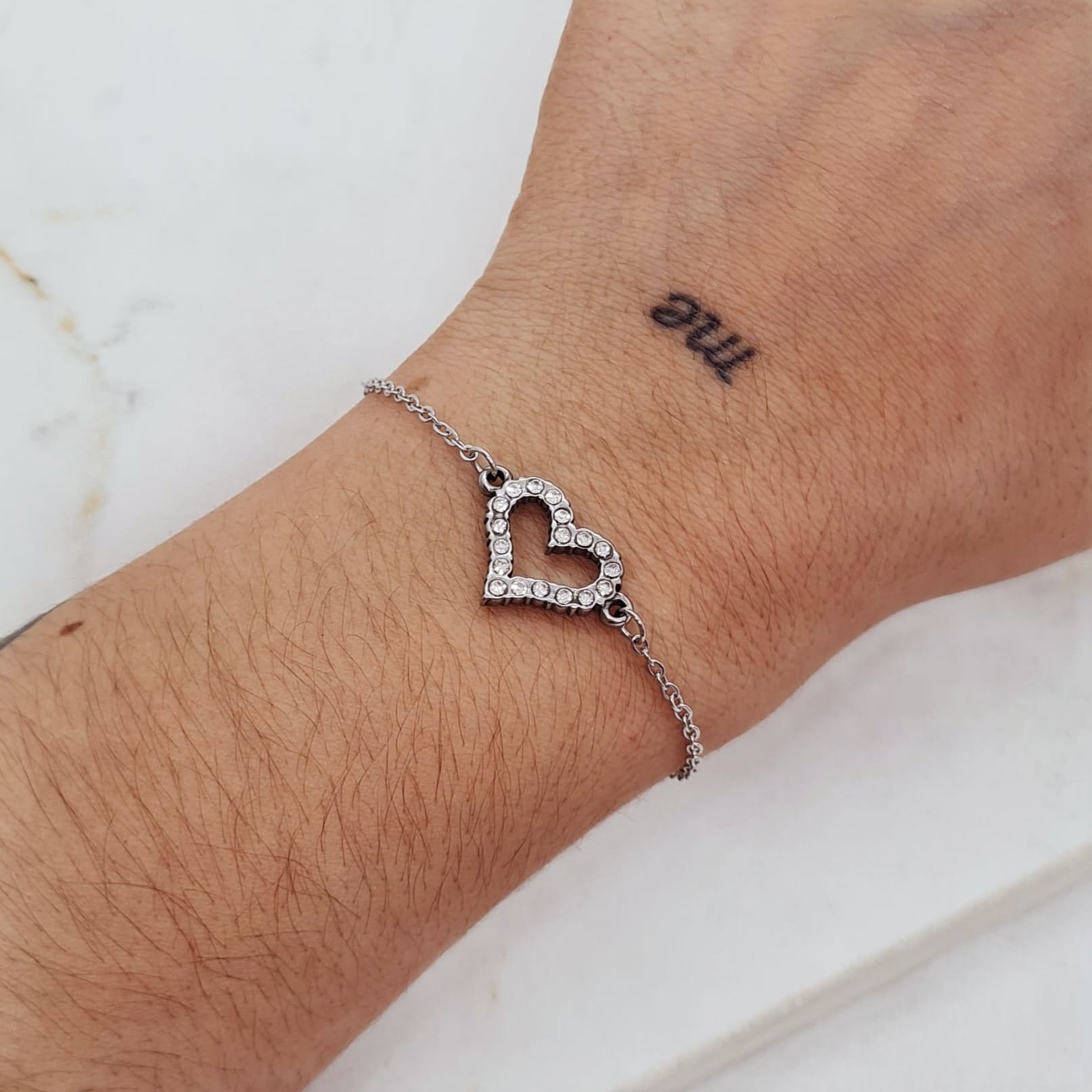 Imagen de producto PULSERA CON CORAZON CALADO FULL STRASS