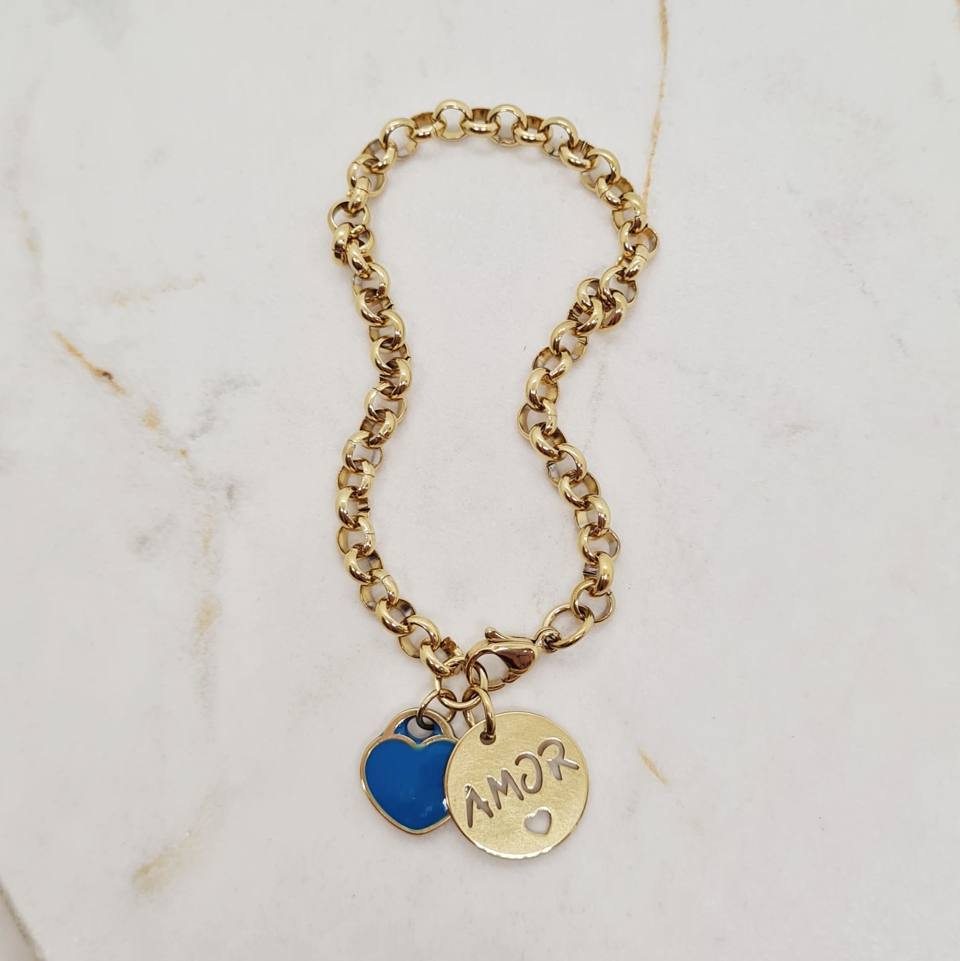 Imagen de producto PULSERA ACERO DORADO ROLO AMOR Y CORAZON CELESTE