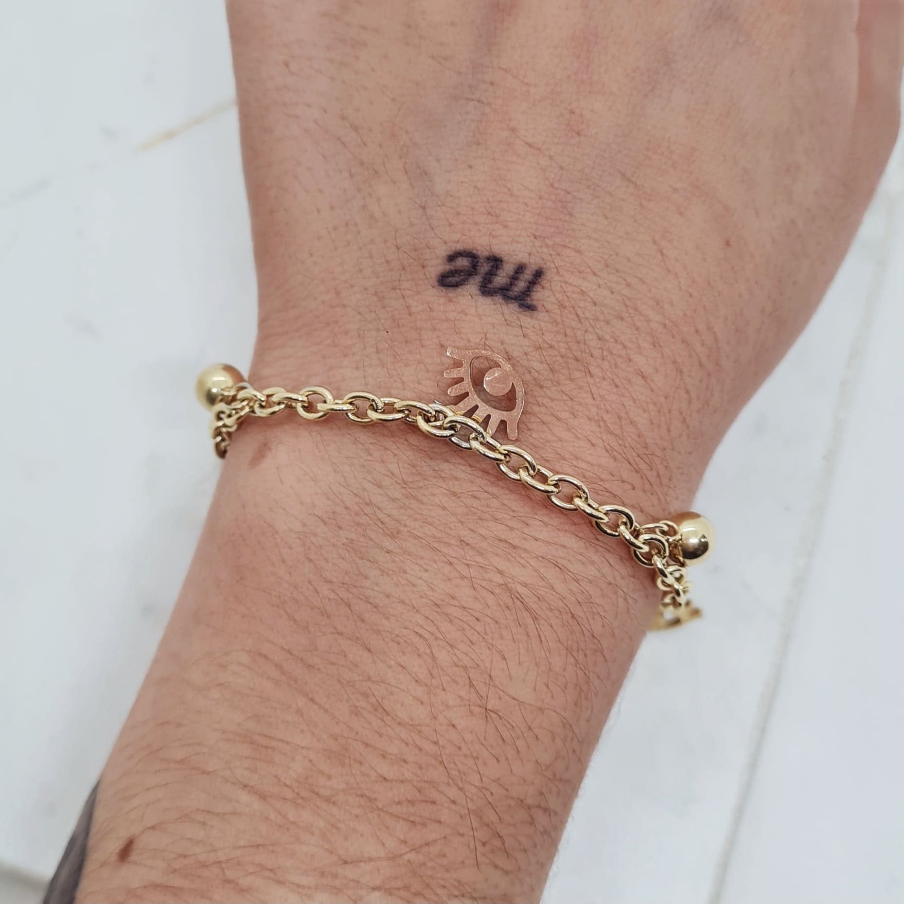 Imagen de producto PULSERA ACERO DORADO TIFFANY CON BOLITAS Y OJO TURCO