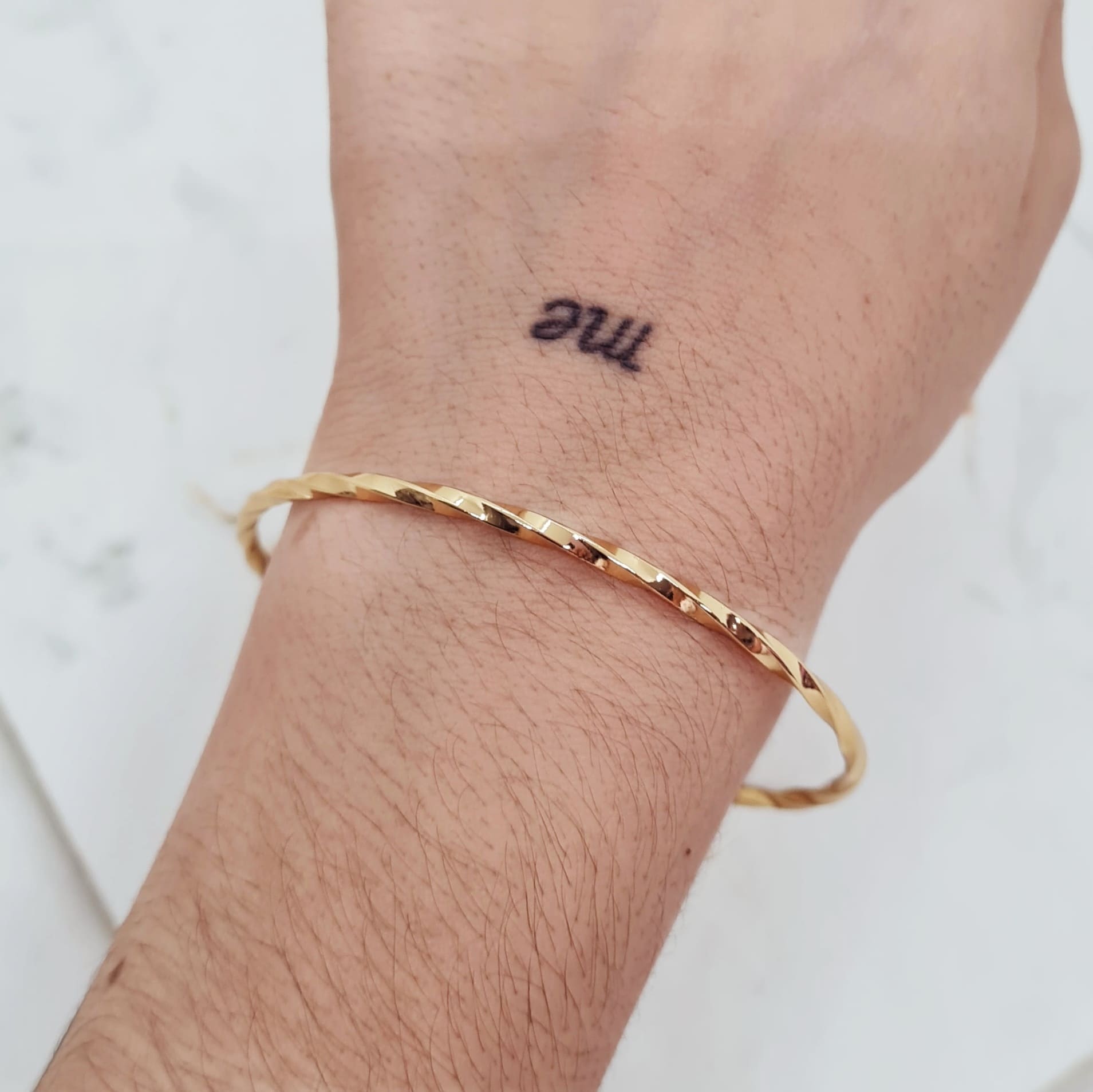 Imagen de producto PULSERA ACERO DORADO ESCLAVA TORZADA