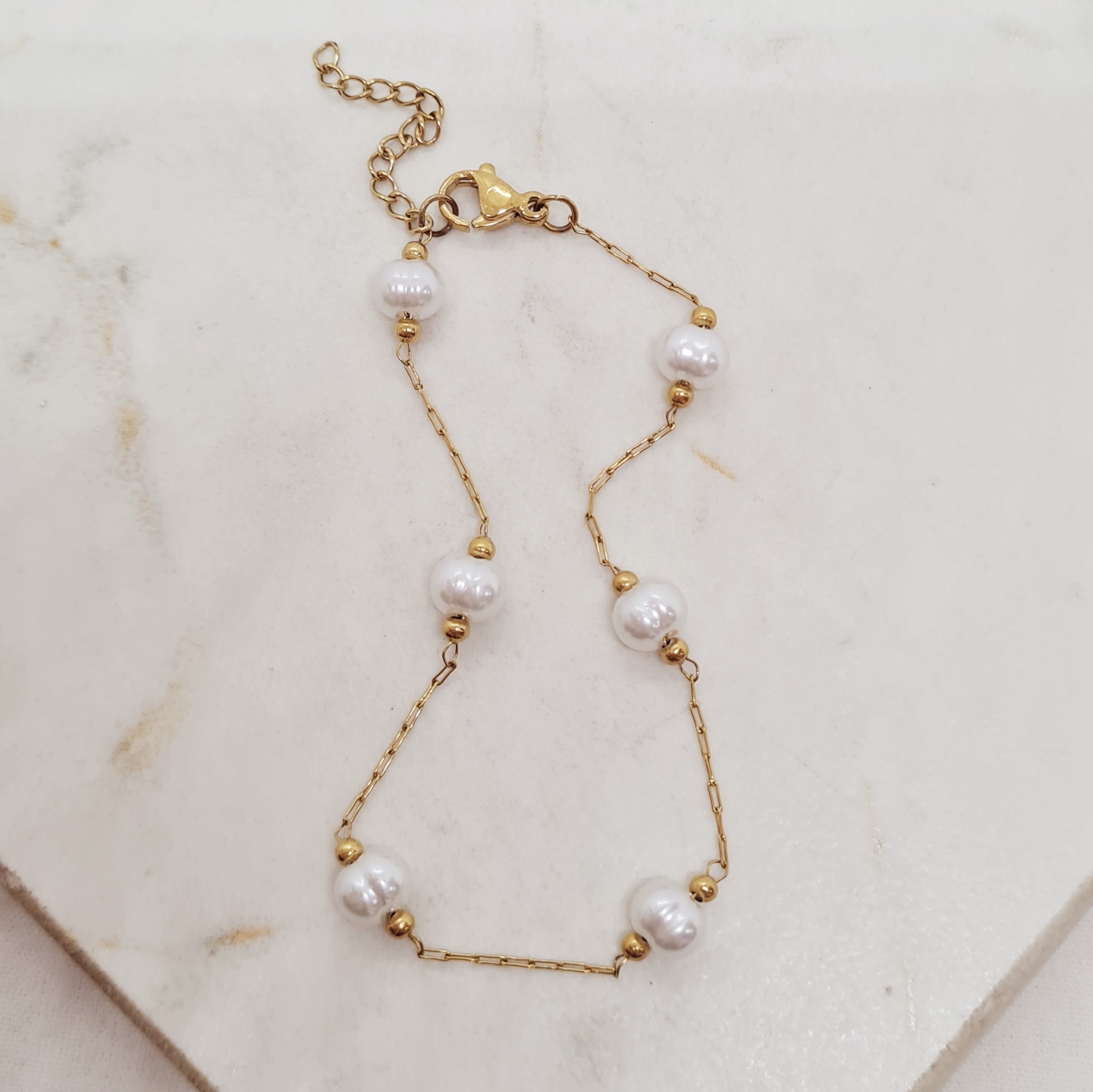 Imagen de producto PULSERA ACERO DORADO FINA CON BOLITAS Y PERLITAS REDONDAS