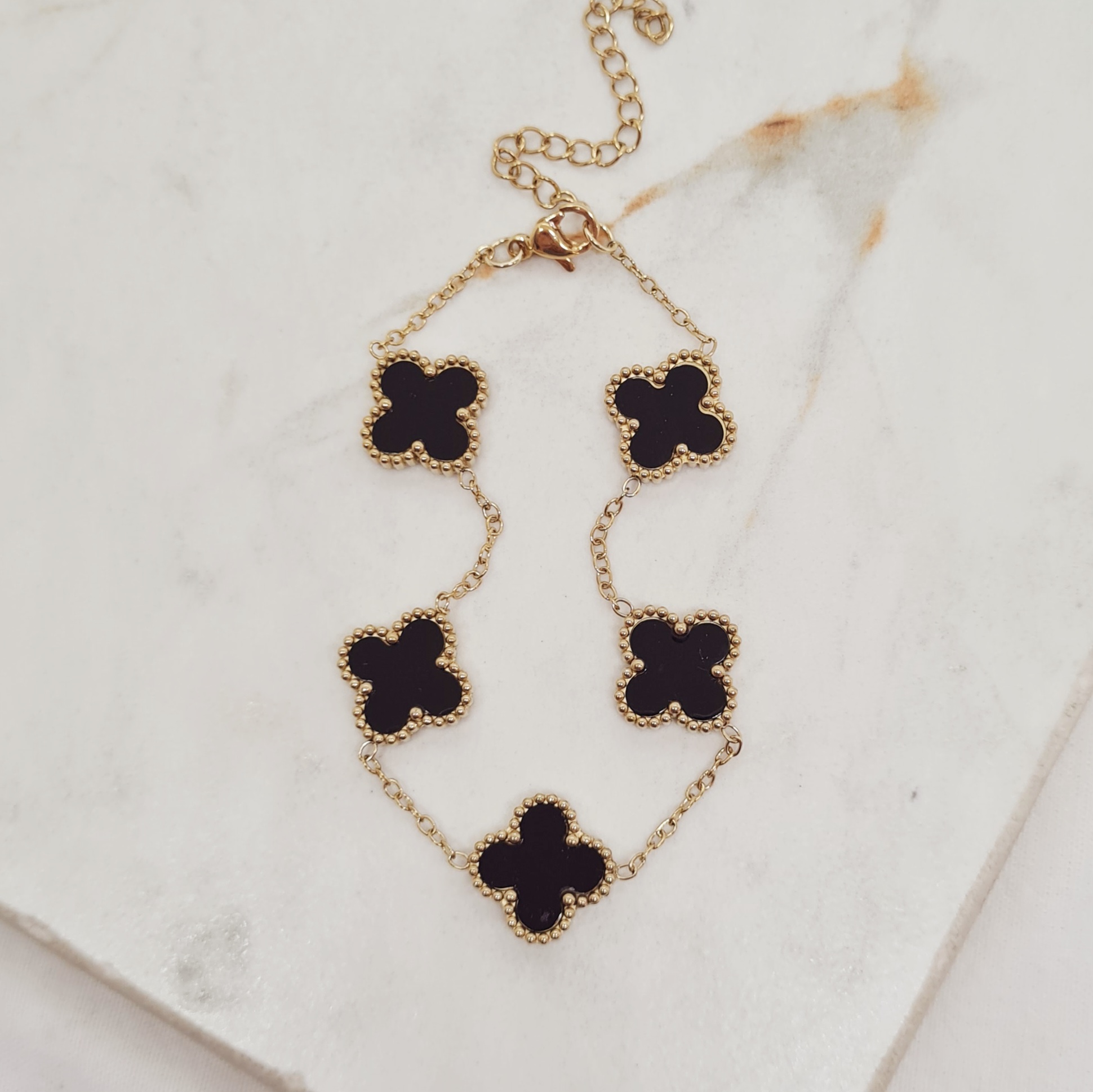 Imagen de producto PULSERA ACERO DORADO VAN CLEEF - NEGRO