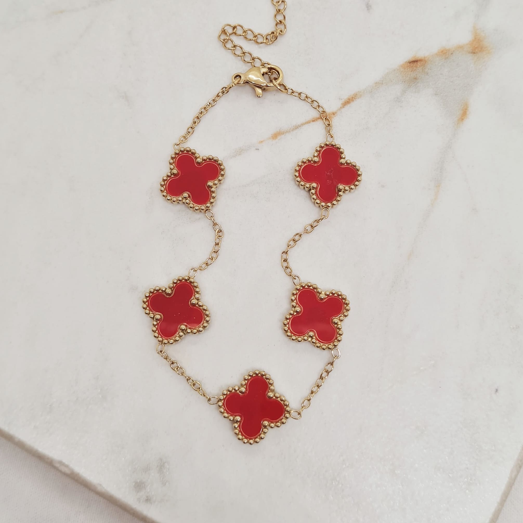Imagen de producto PULSERA ACERO DORADO VAN CLEEF - ROJO