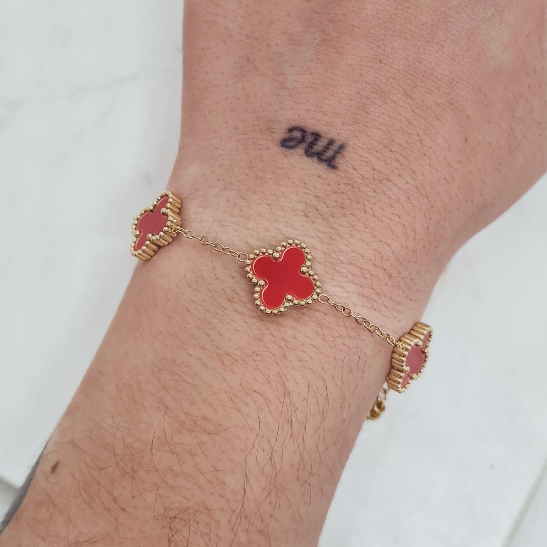 Imagen de producto PULSERA ACERO DORADO VAN CLEEF - ROJO