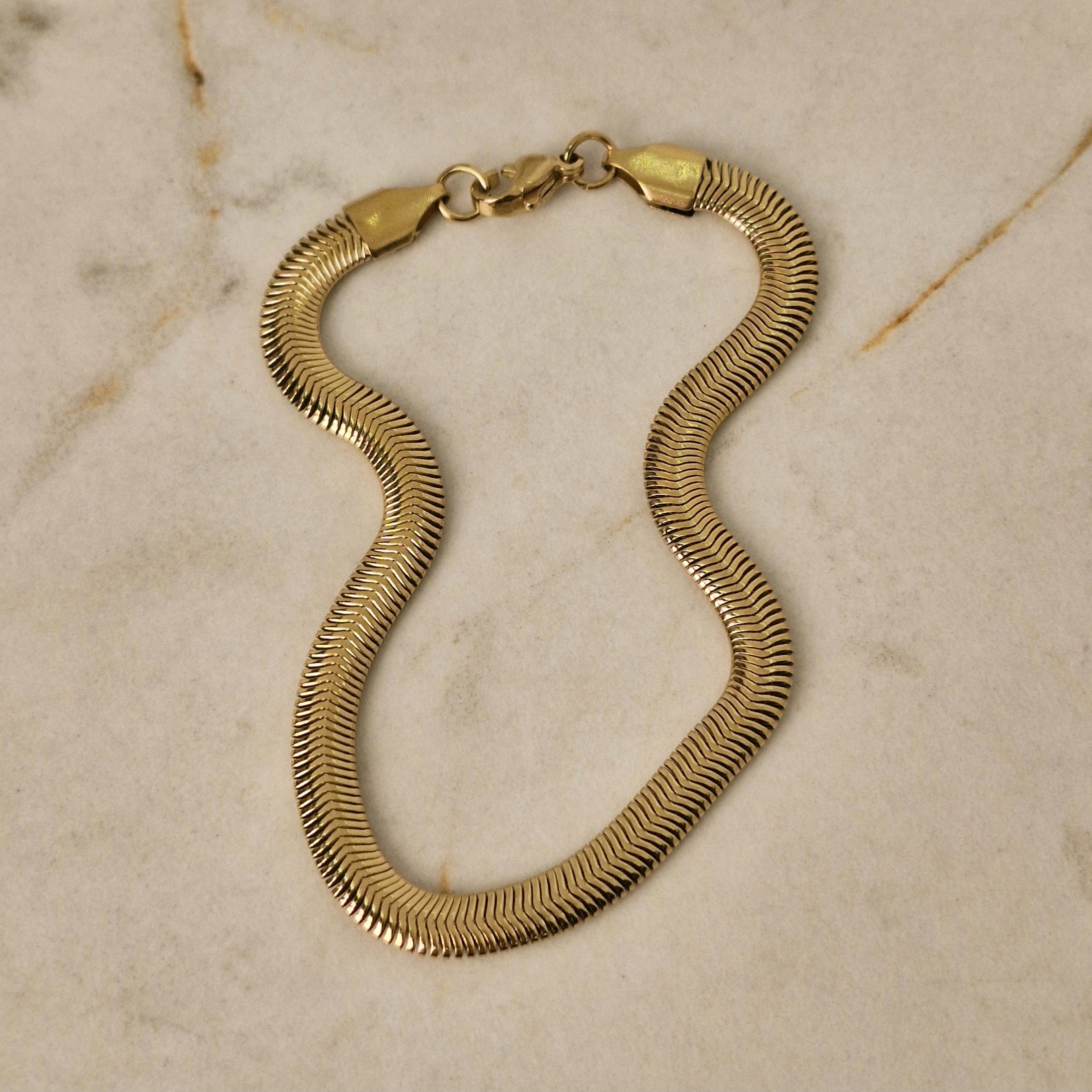 Imagen de producto PULSERA ACERO DORADO SERPIENTE GRUESA