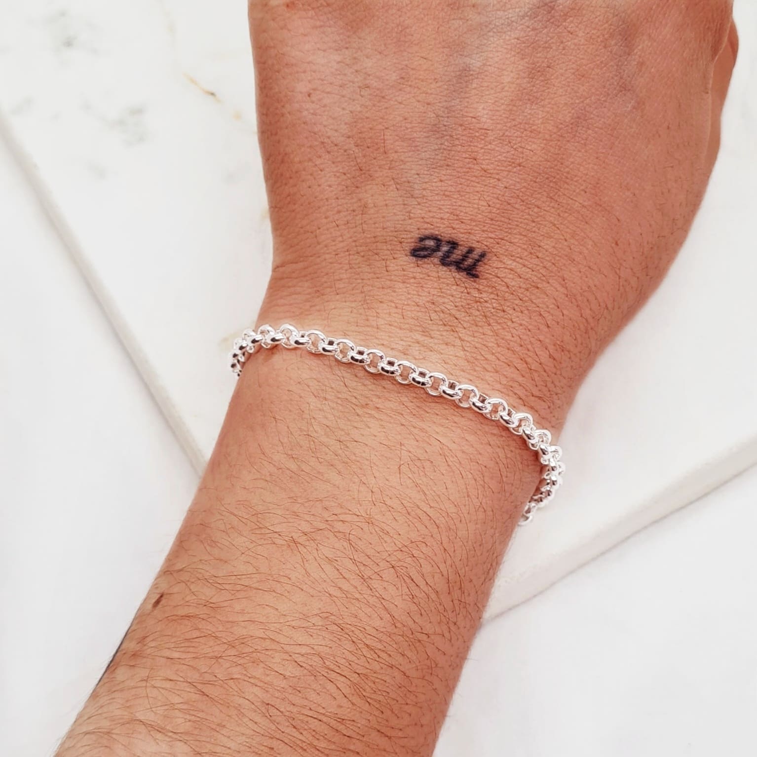 Imagen de producto PULSERA ACERO BLANCO ROLO FINA 4 mm